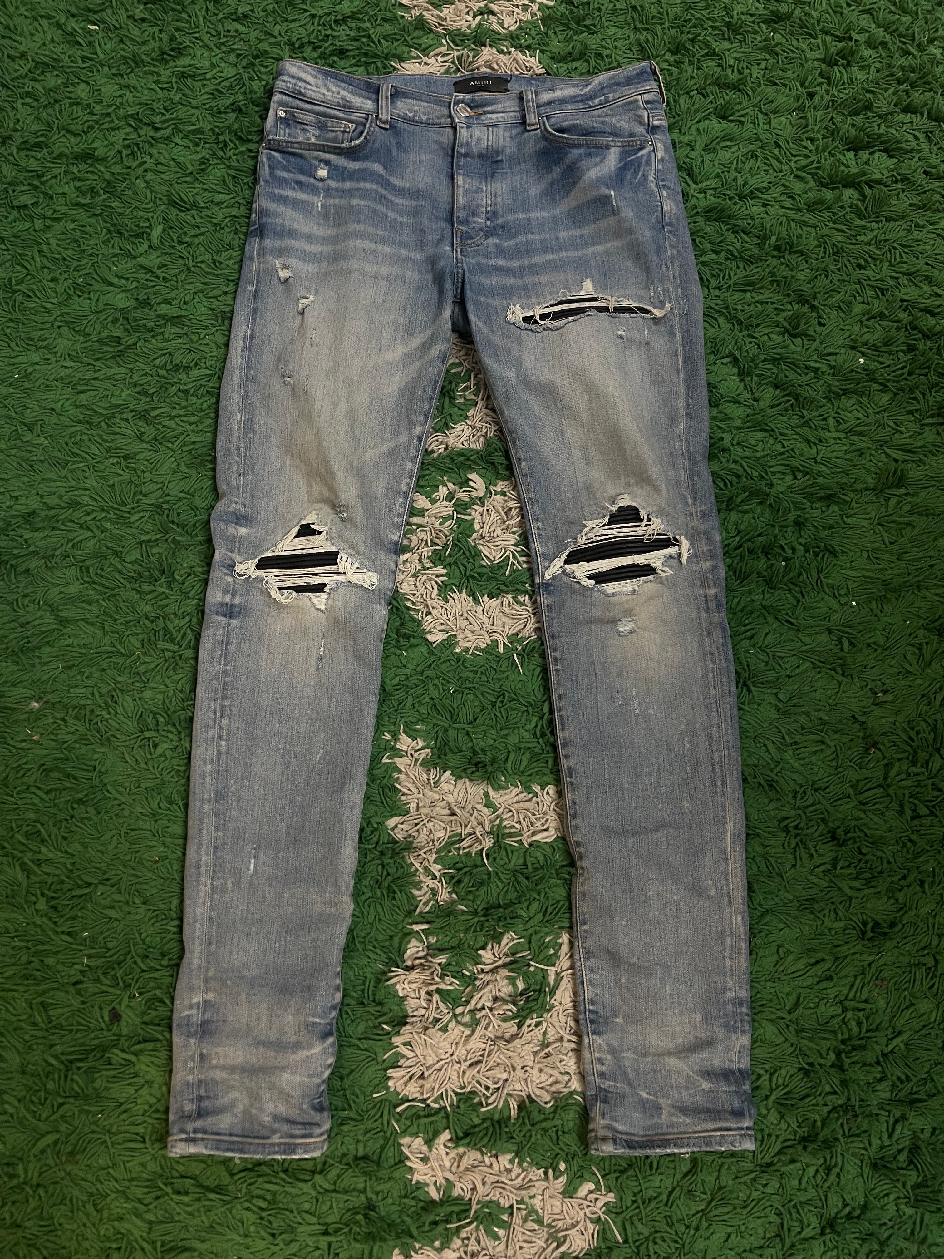 Amiri Mx1 Light Wash Black Patch Jeans