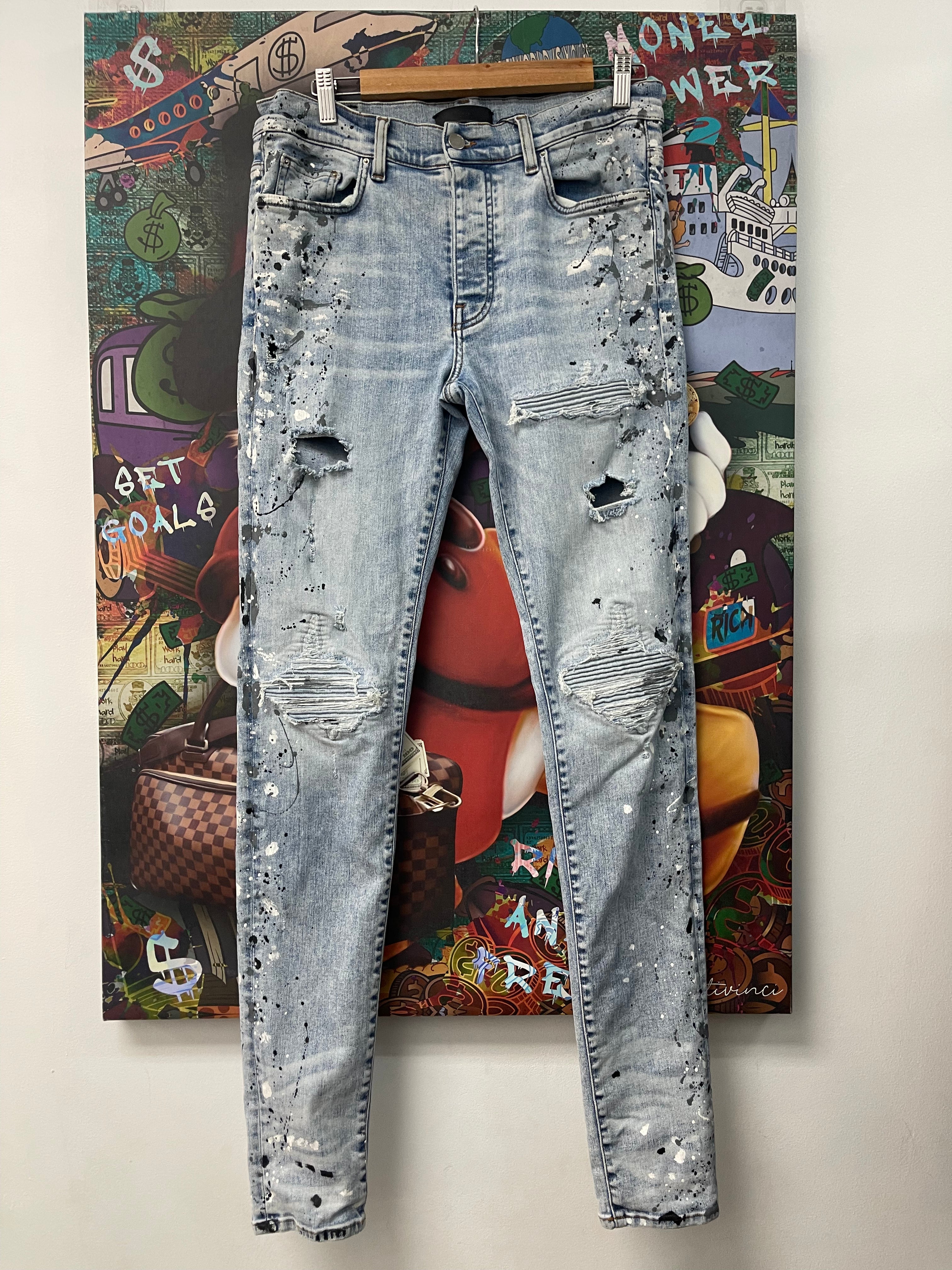 Amiri Light Wash Denim Splatter Patch MX1 Jeans