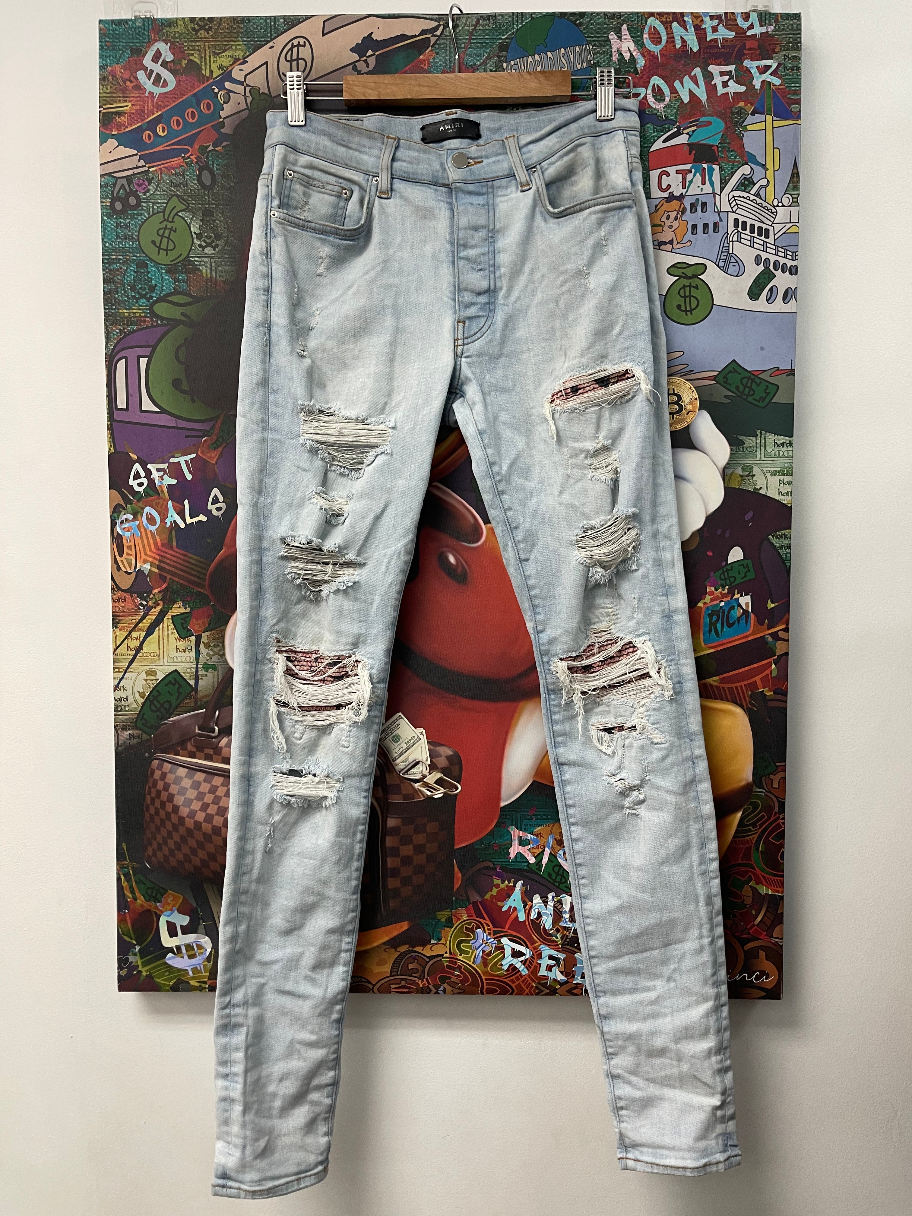 Amiri Light Wash Black Pink Floral Patch MX1 Jeans