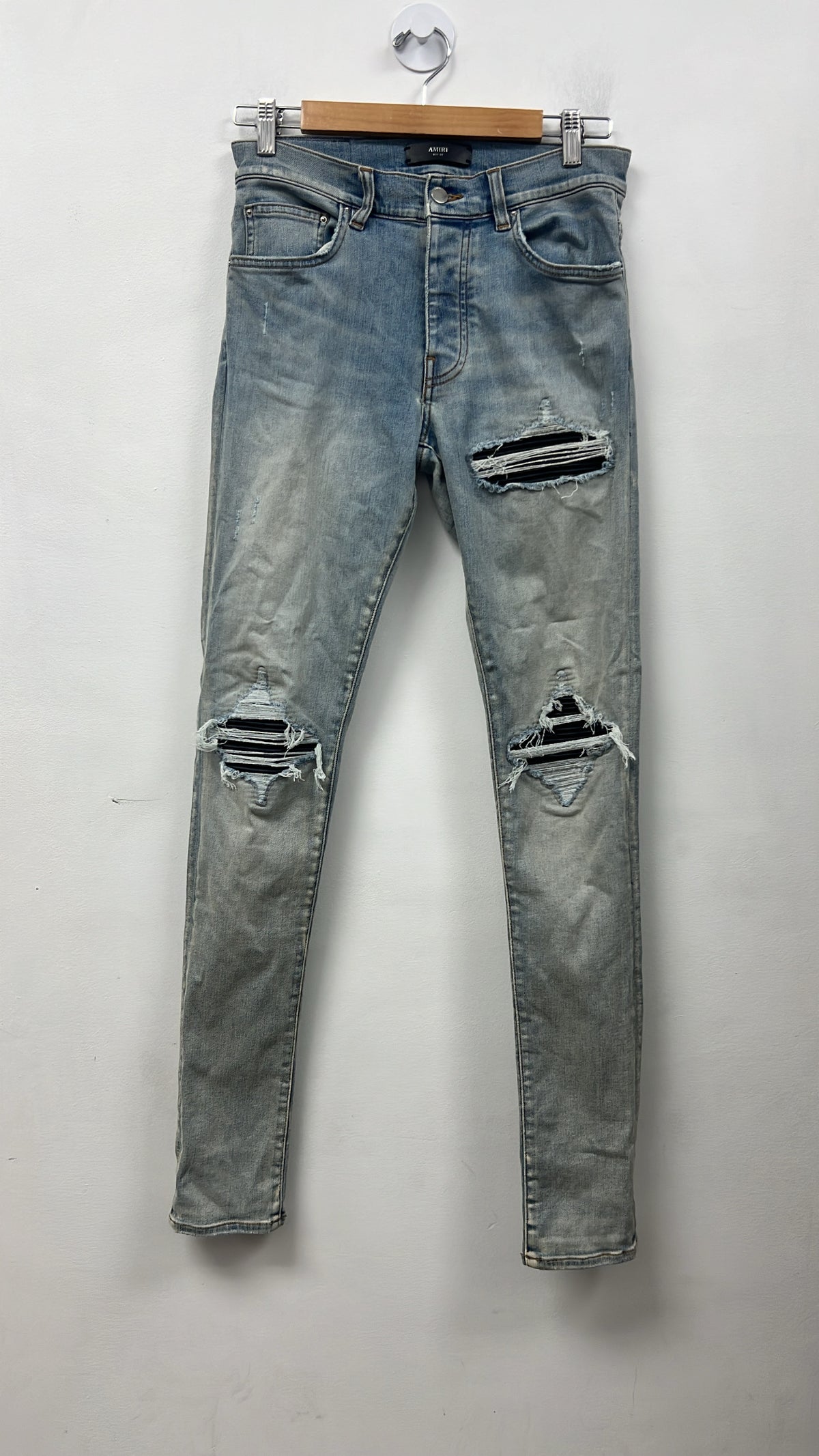 Amiri MX1 Light Wash Black Patch Jeans