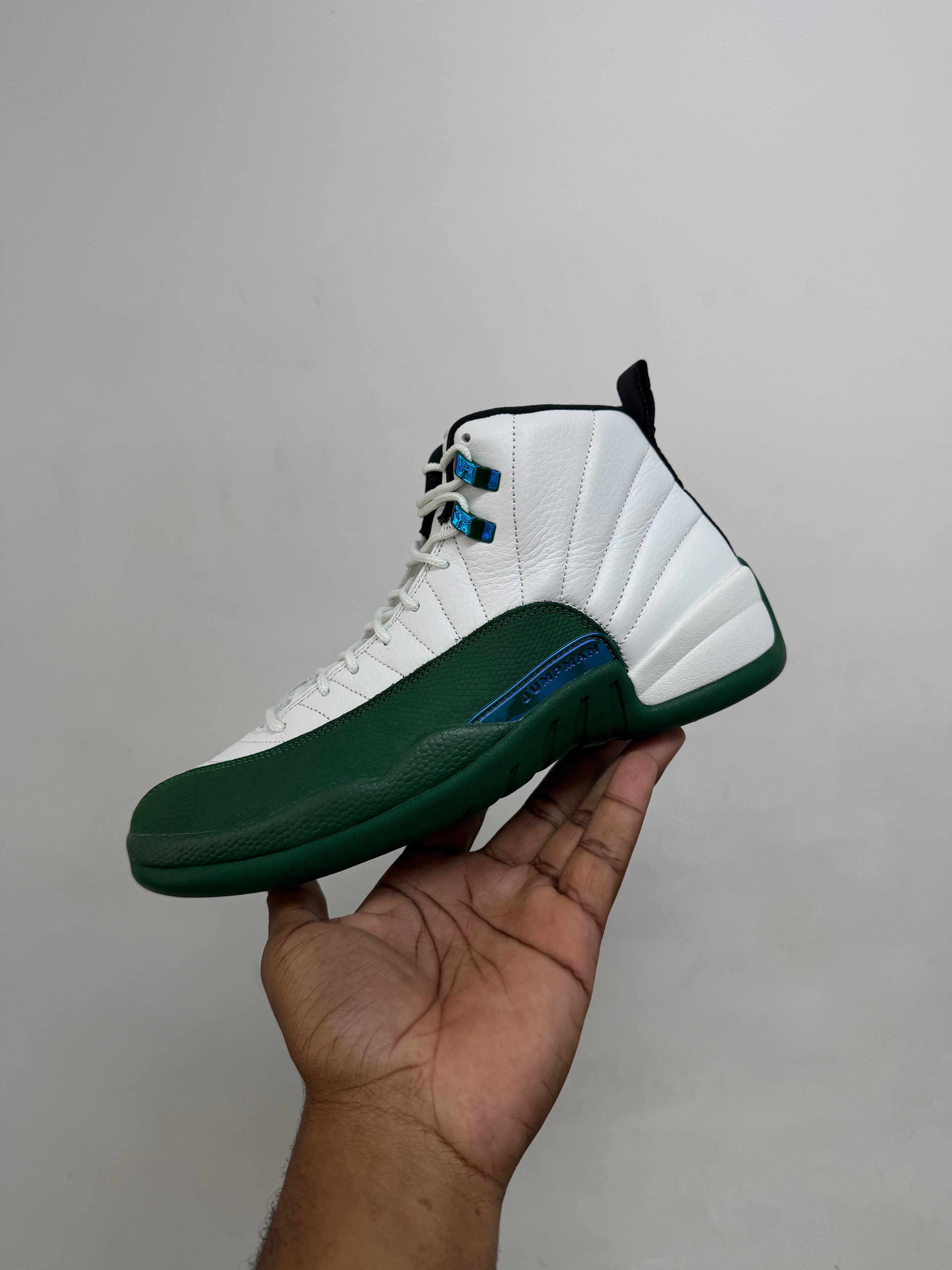 Jordan 12 Buck Green Sneakers