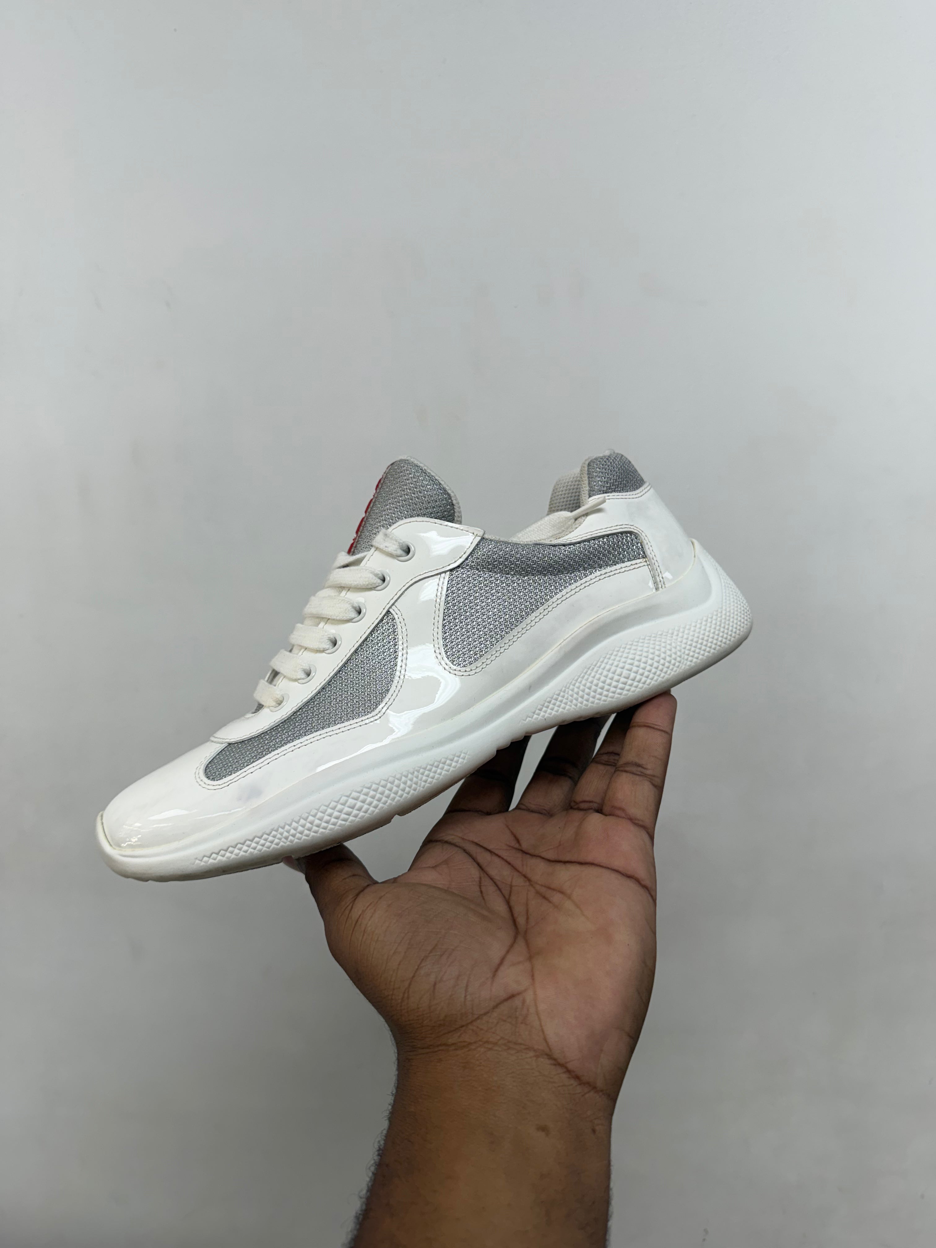 Prada White Patent Cup Sneakers
