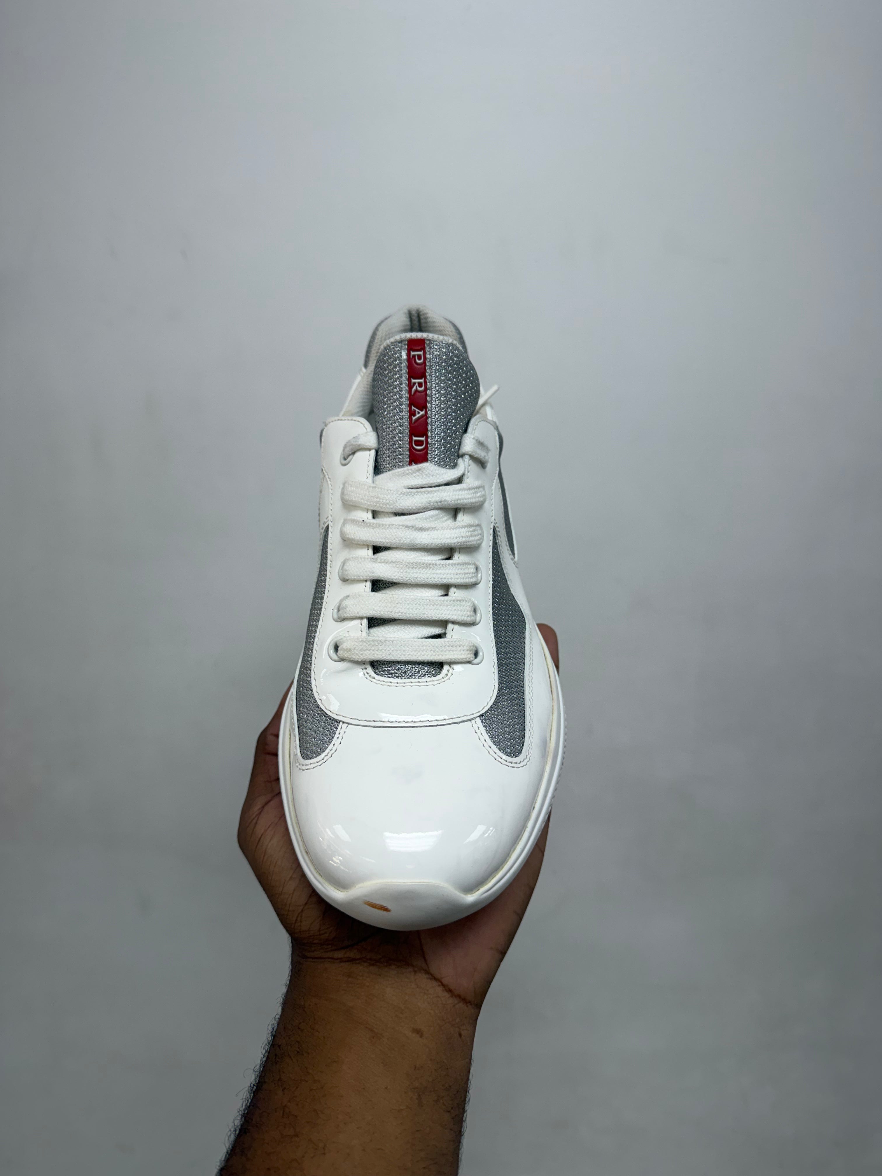 Prada White Patent Cup Sneakers
