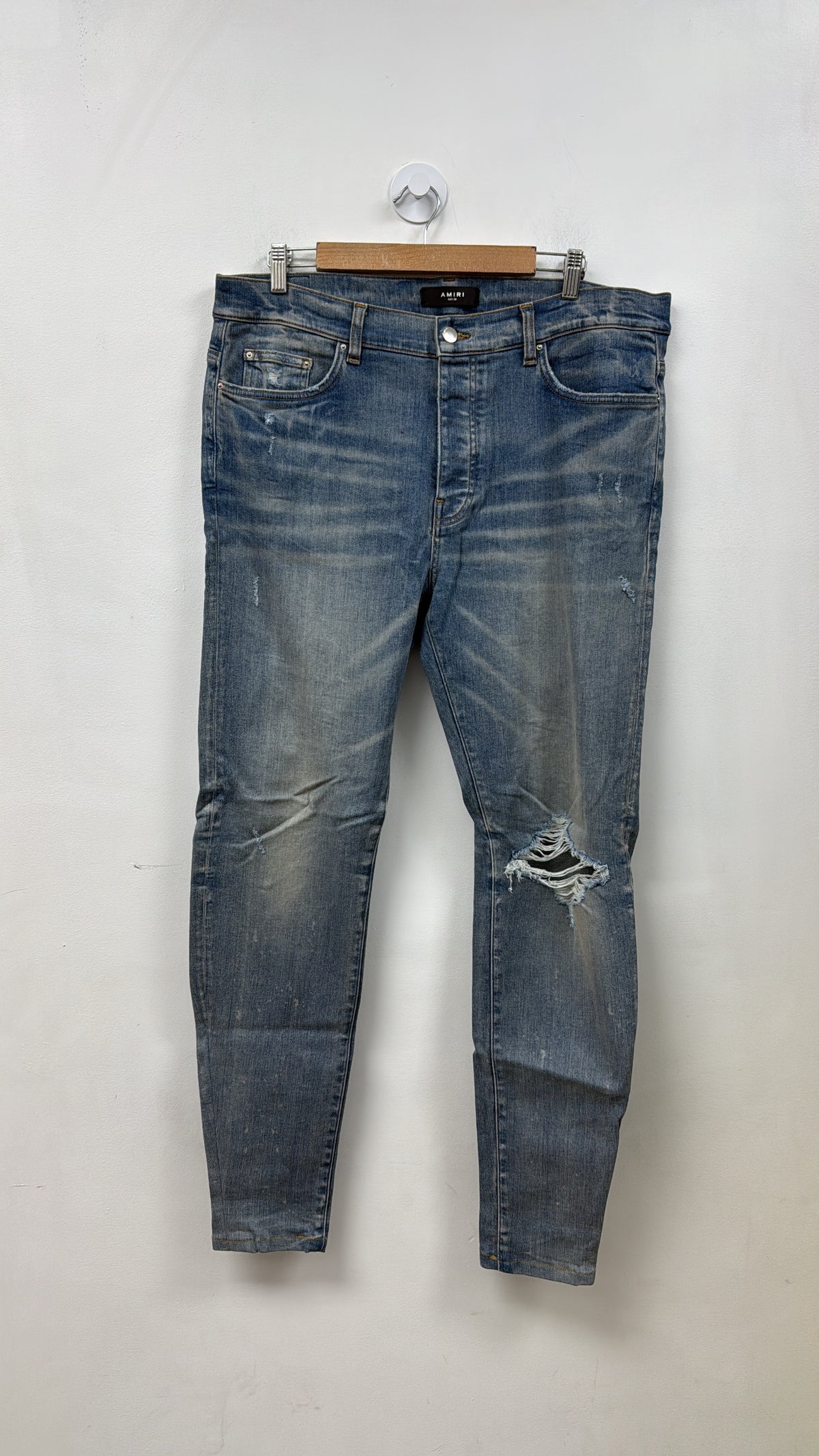 Amiri Light Wash Knee Rip Jeans