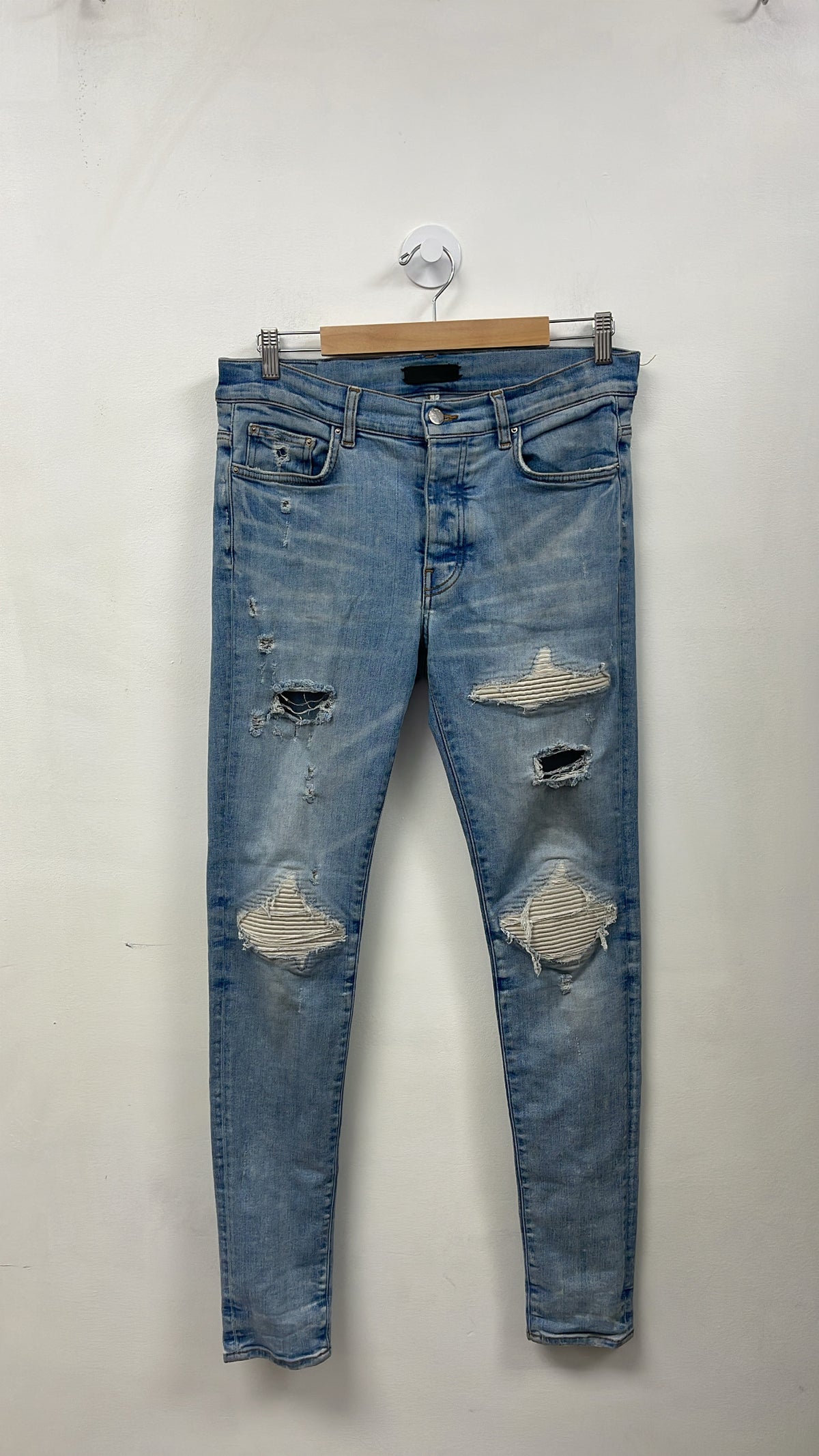 Amiri MX1 Light Wash White Patch Jeans
