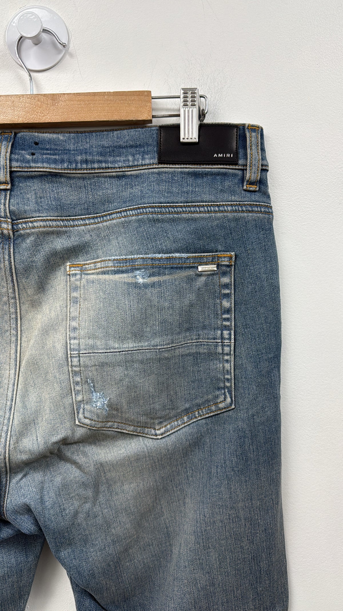 Amiri Light Wash Knee Rip Jeans