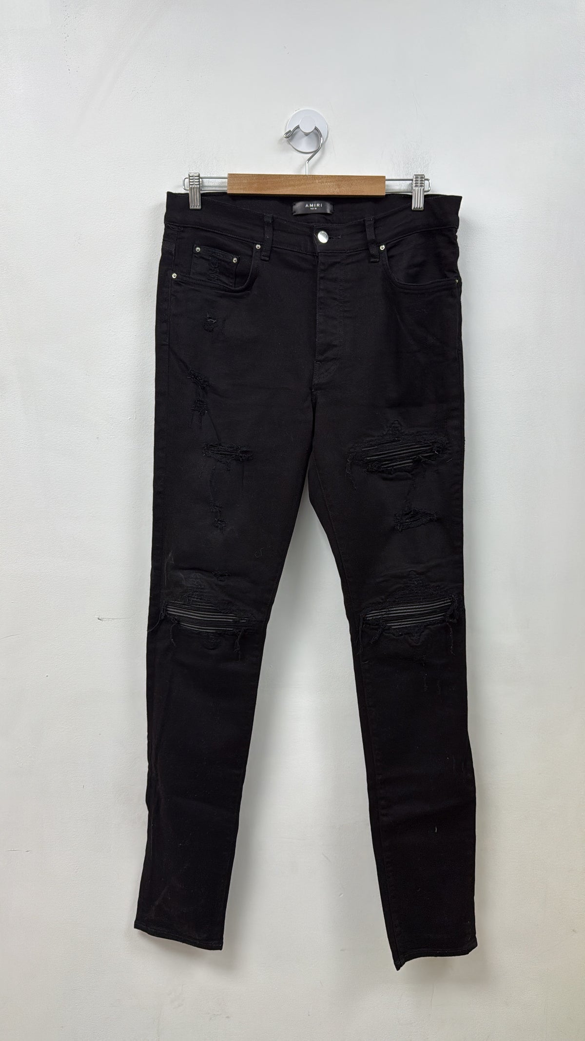 Amiri MX1 Light Wash Black Leather Patch Jeans