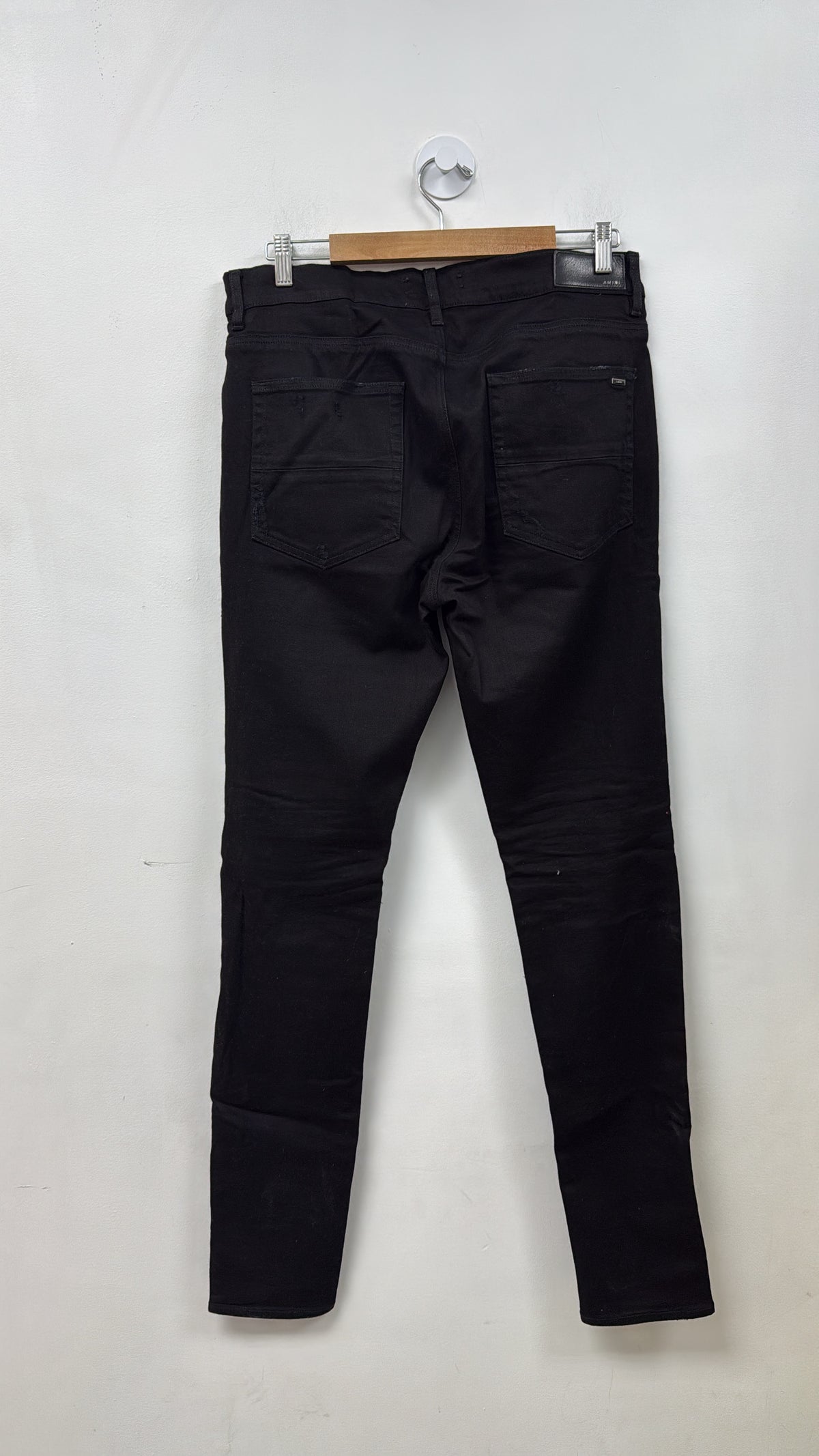 Amiri MX1 Light Wash Black Leather Patch Jeans