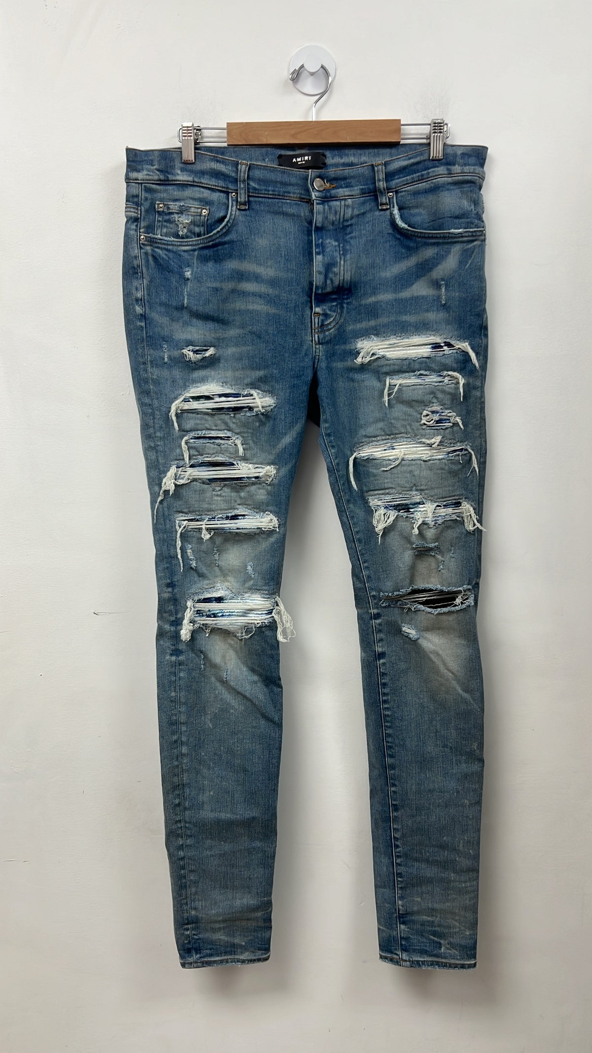Amiri Jeans Light Wash Tie Dye Thrasher Patch Jeans