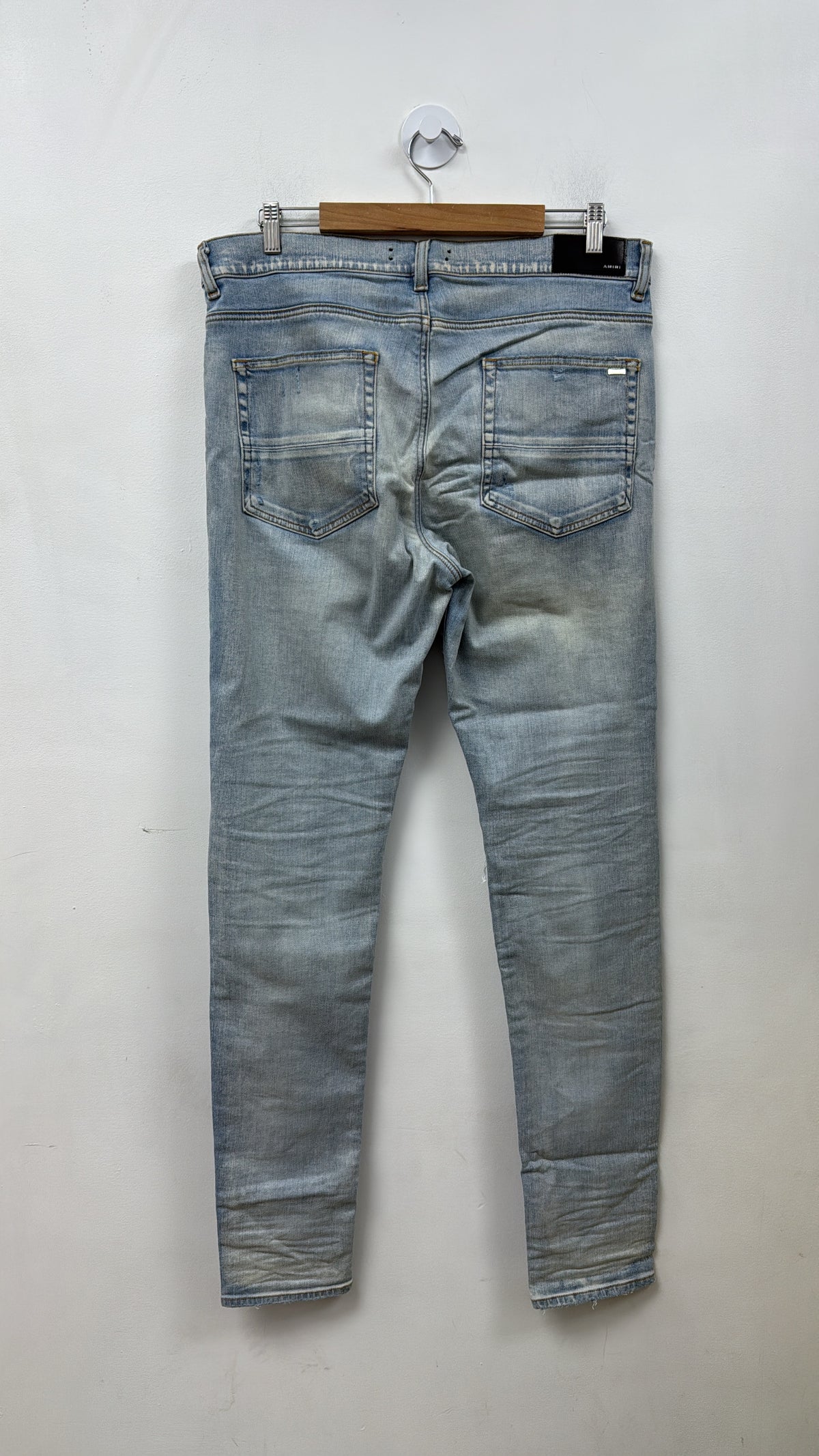 Amiri MX1 Light Wash Camo Patch Jeans