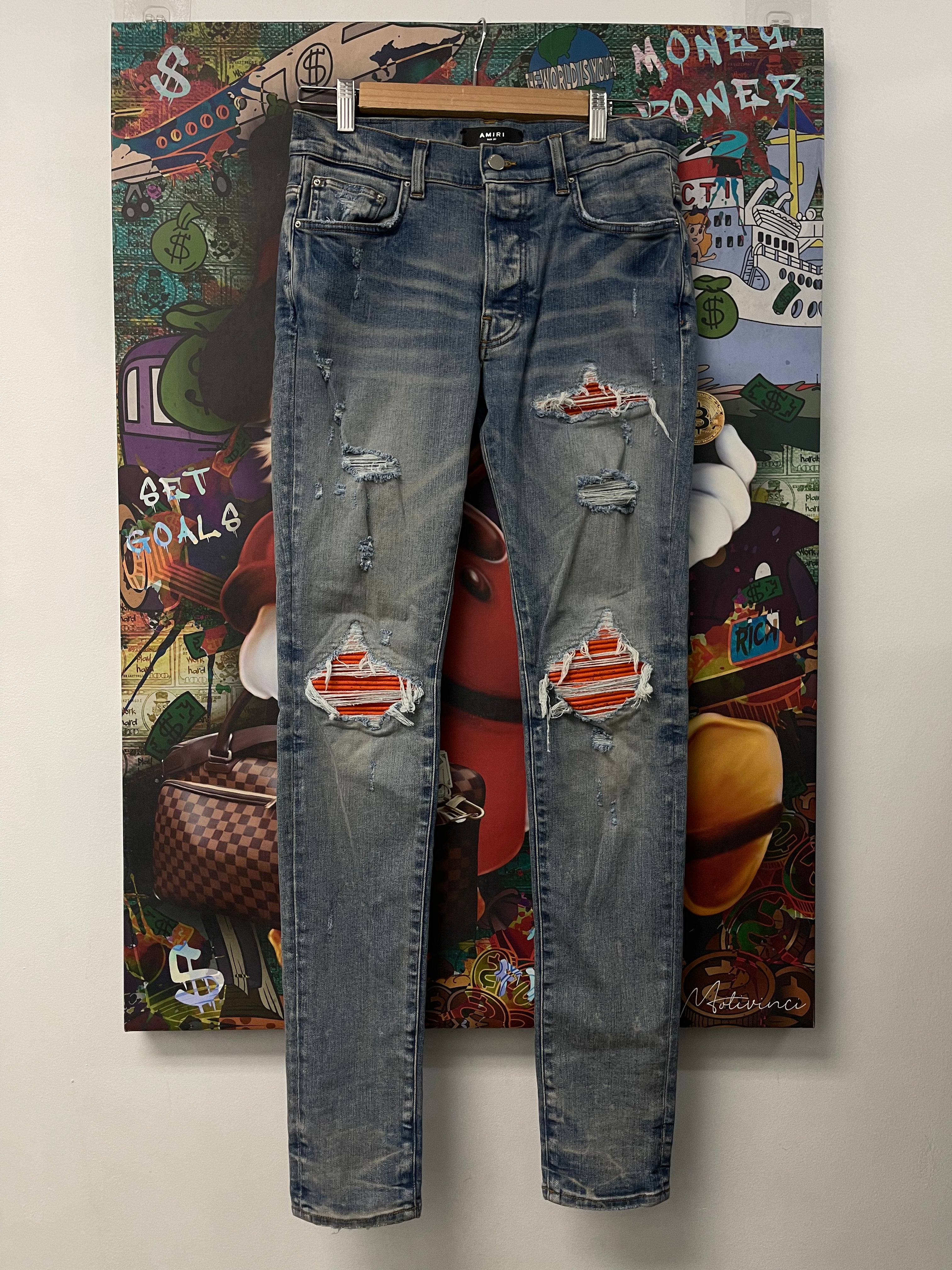 Amiri MX1 Light Wash Orange Crackle Patch Jeans