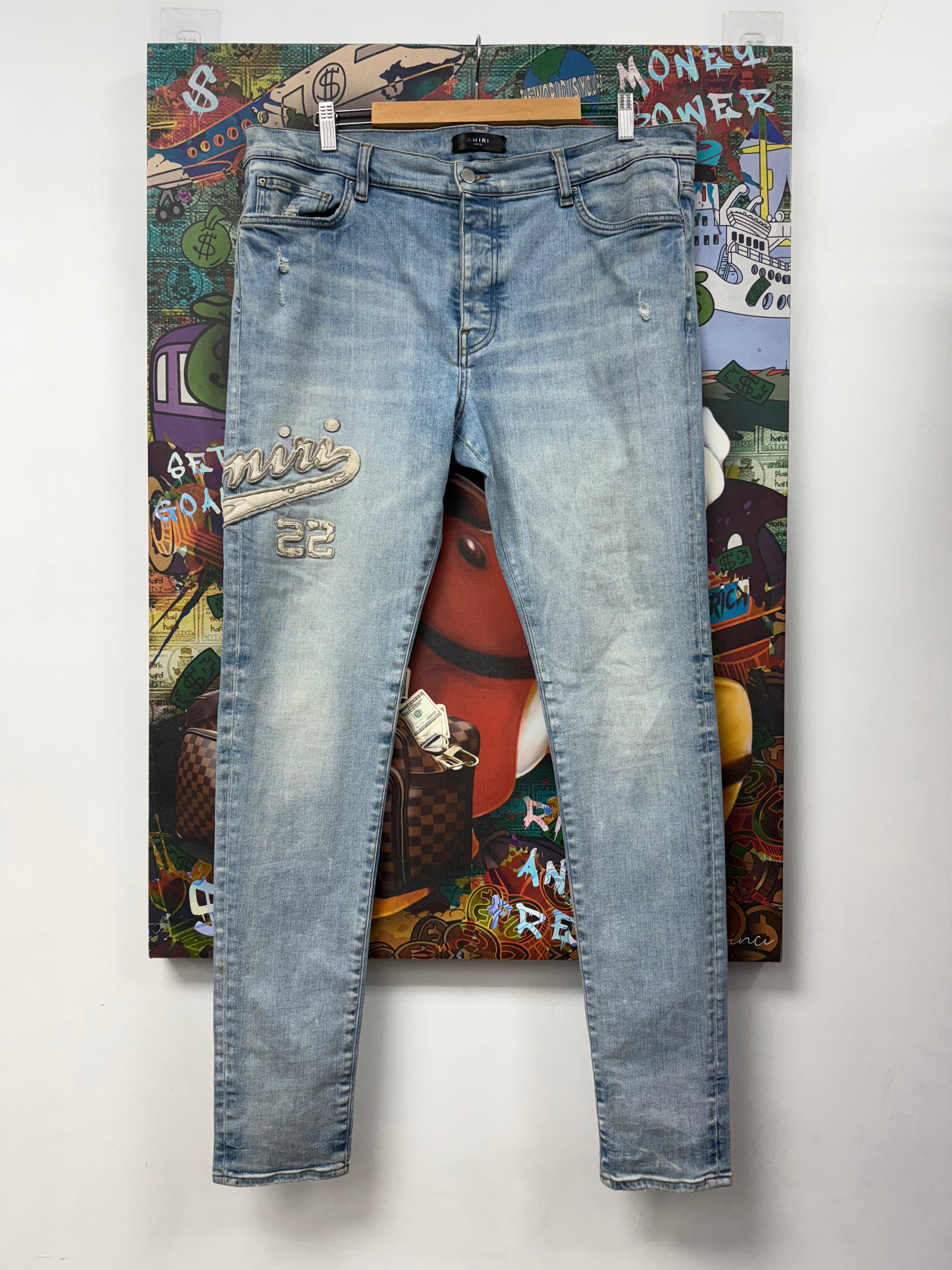 Amiri Light Wash 22 Logo Jeans