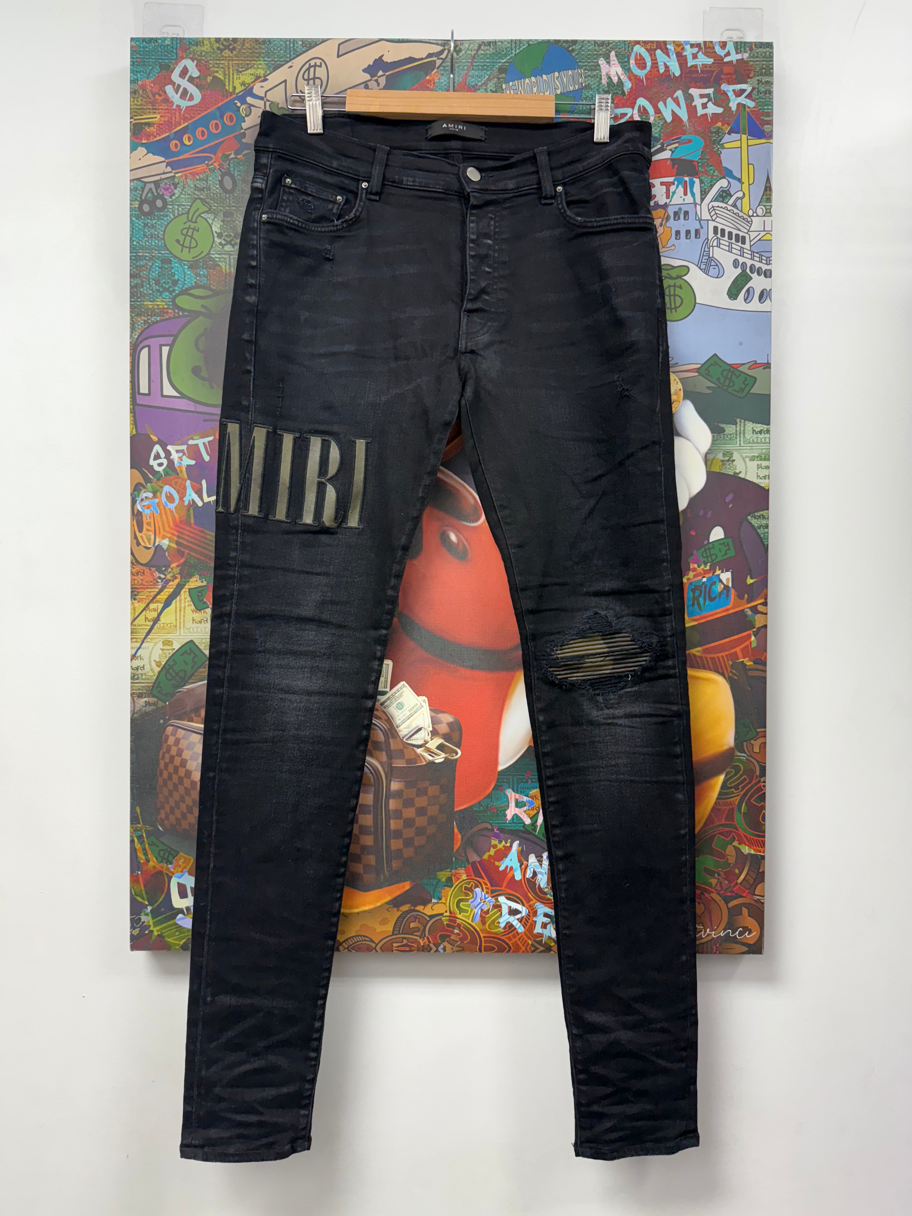 Amiri Black Wash Camo Patch Side Logo Jeans