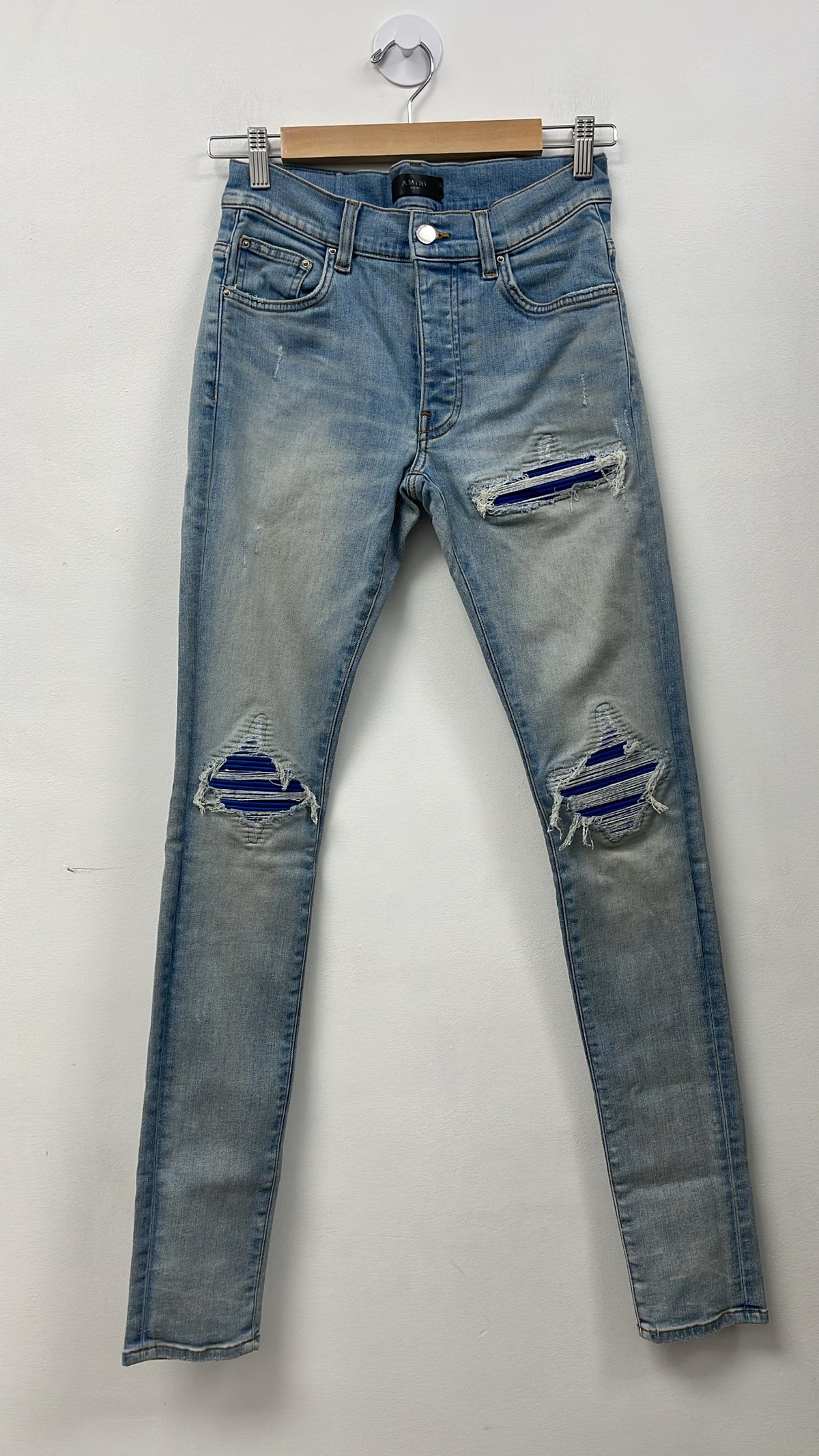 Amiri MX1 Light Wash Blue Suede Patch Jeans