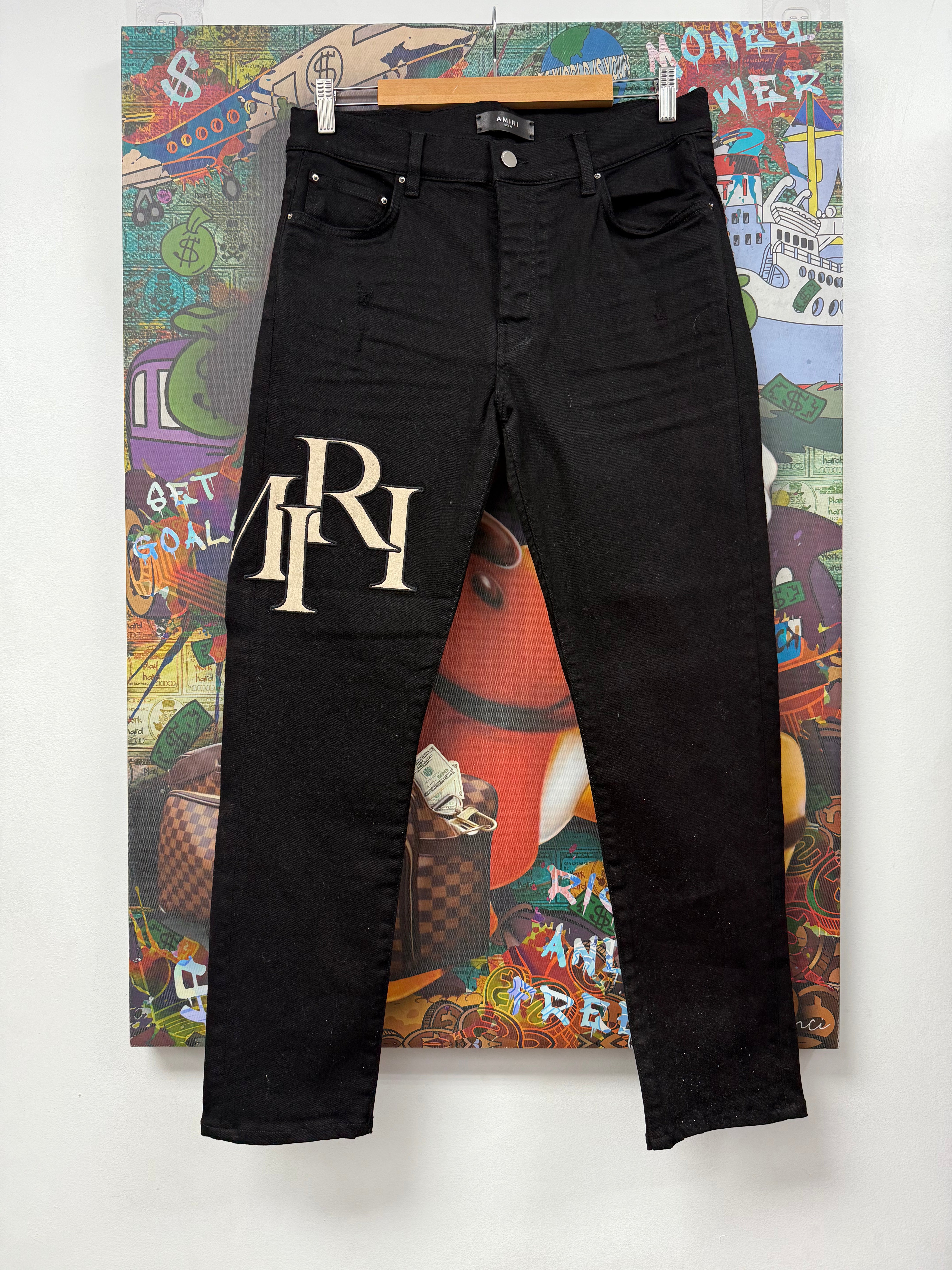 Amiri Black Cream Staggered Side Logo Jeans