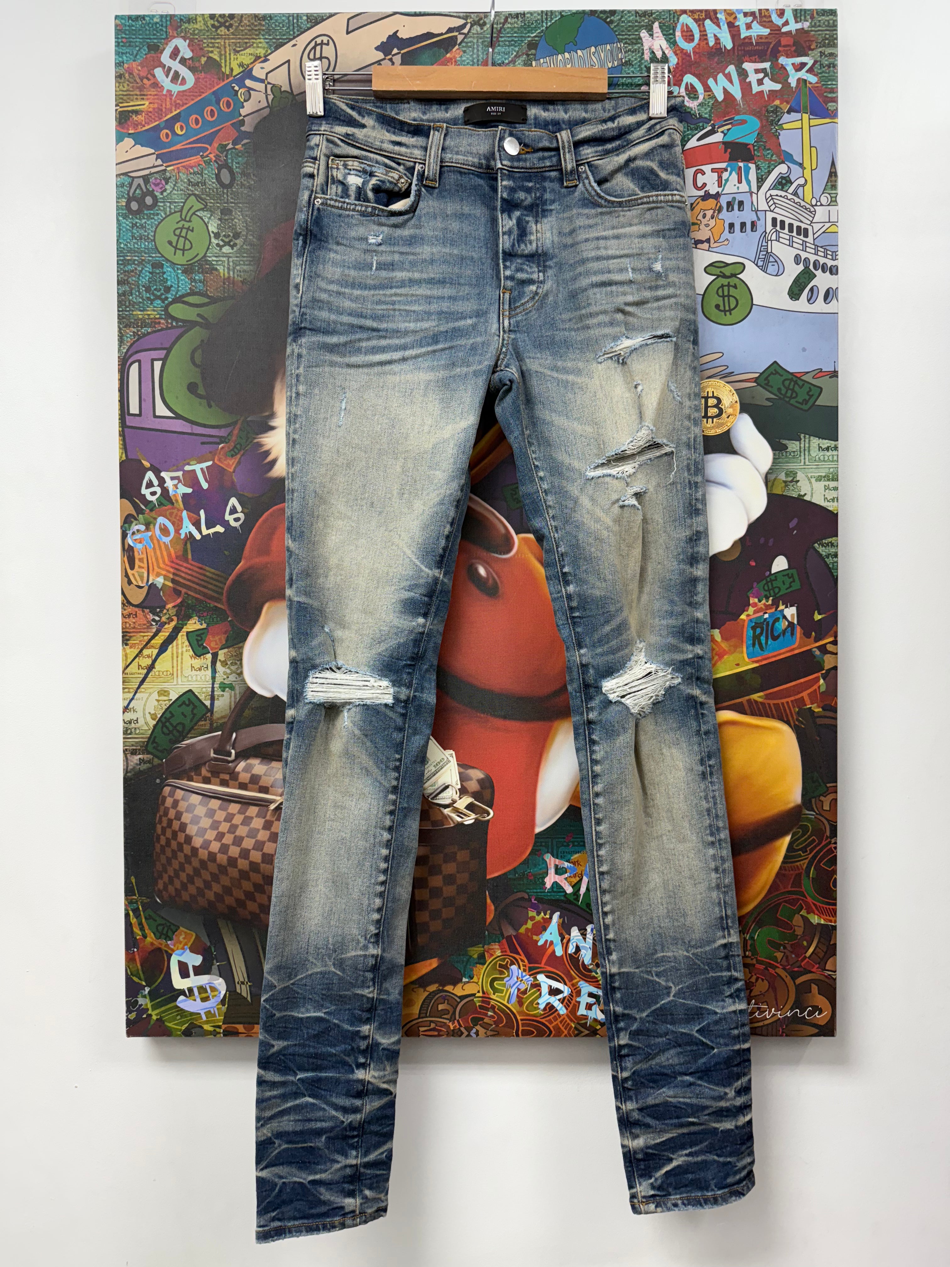 Amiri Light Wash Ripped Plain Thrasher Jeans