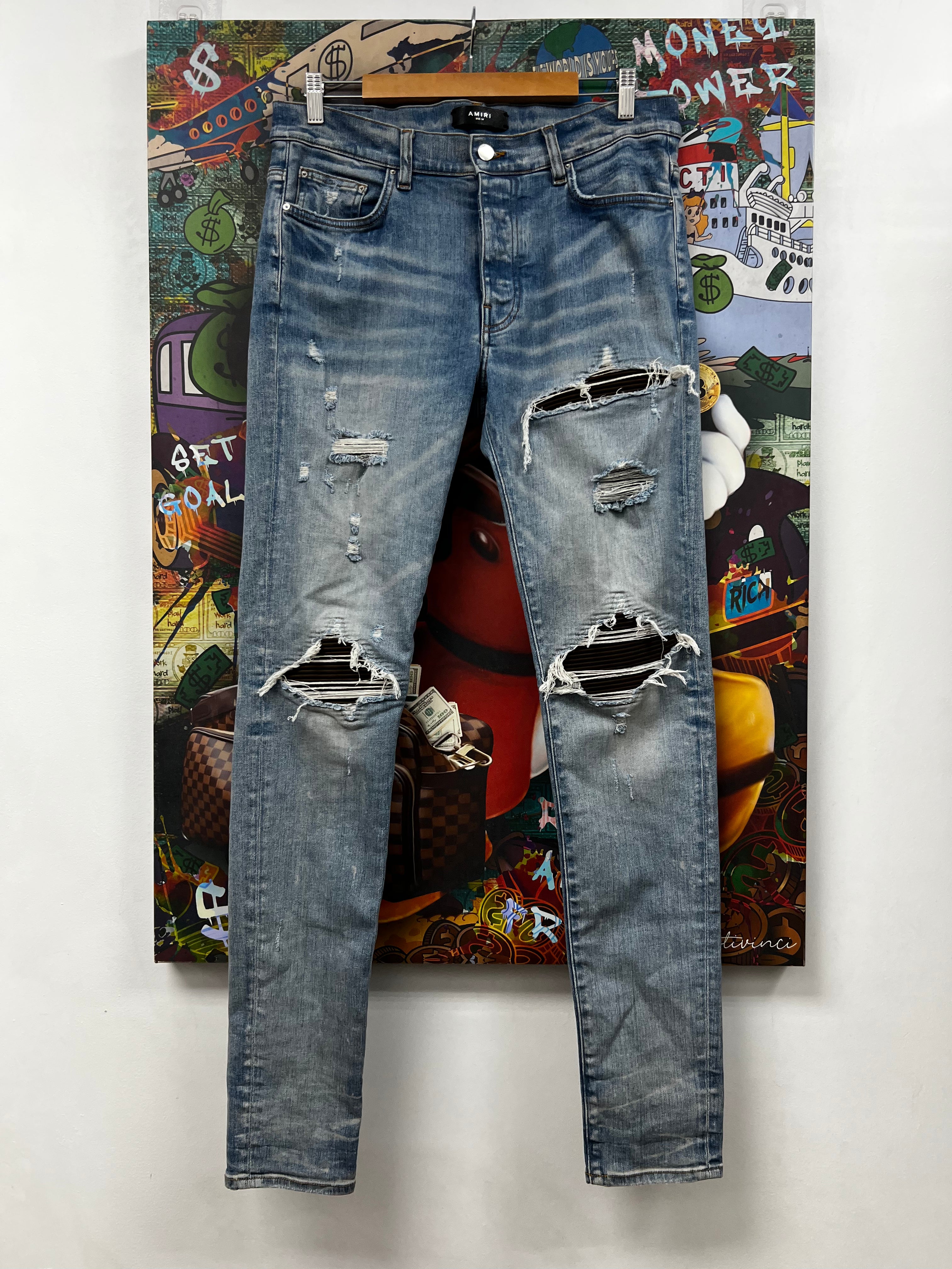 Amiri MX1 Light Wash Brown Suede Patch Jeans