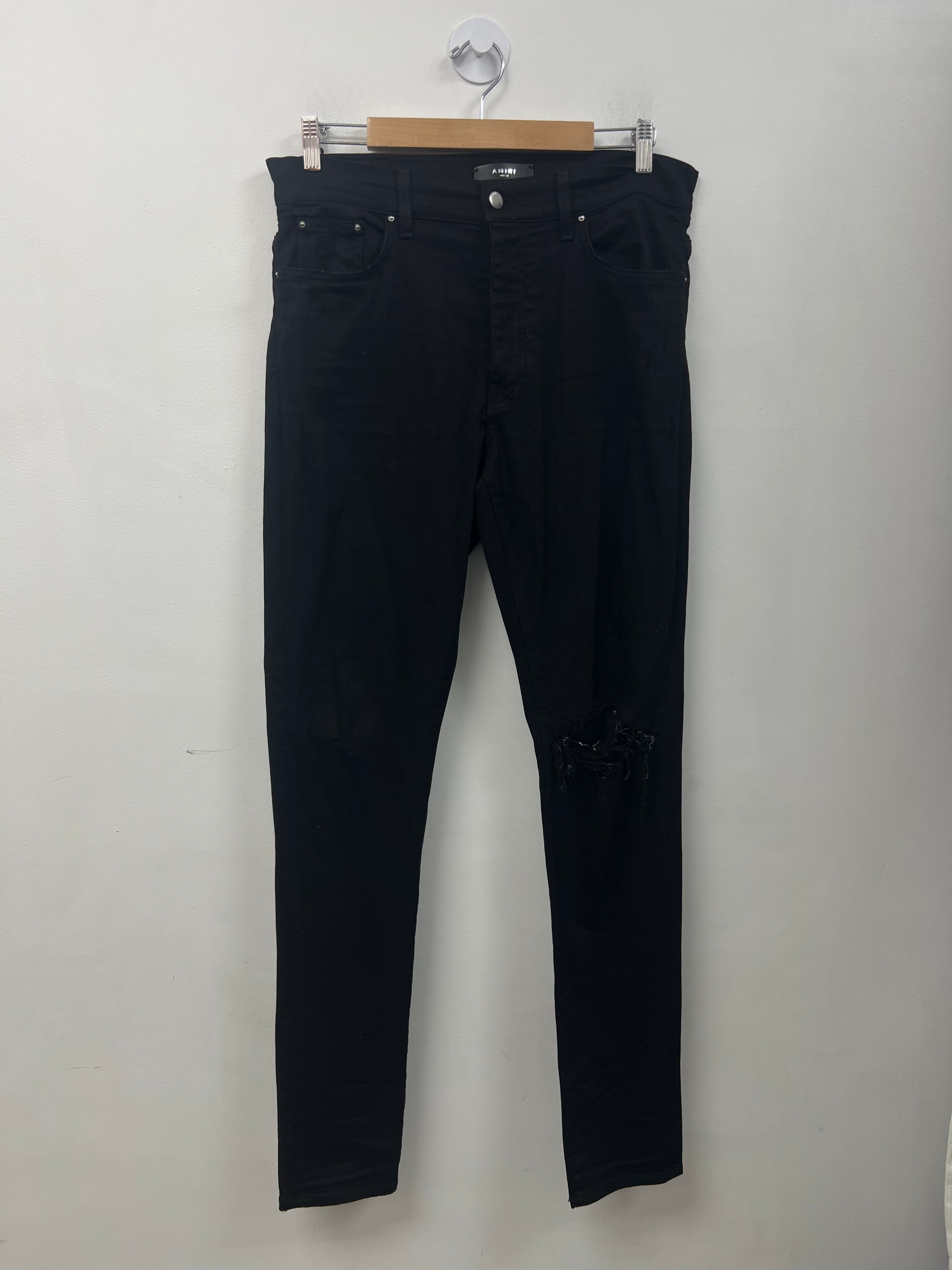 Amiri Black Ripped Thrasher Jeans