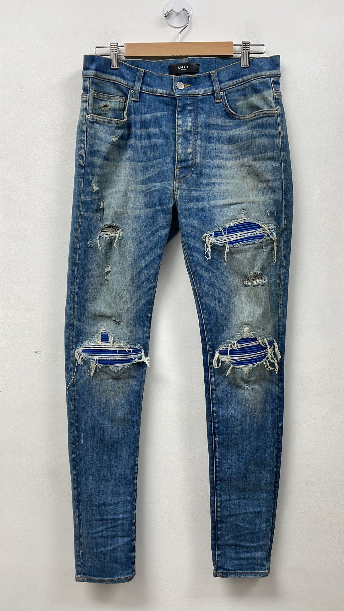 Amiri MX1 Light Wash Blue Suede Patch Jeans