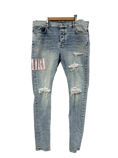 Amiri Pink Side Logo Light Wash Blue Jeans