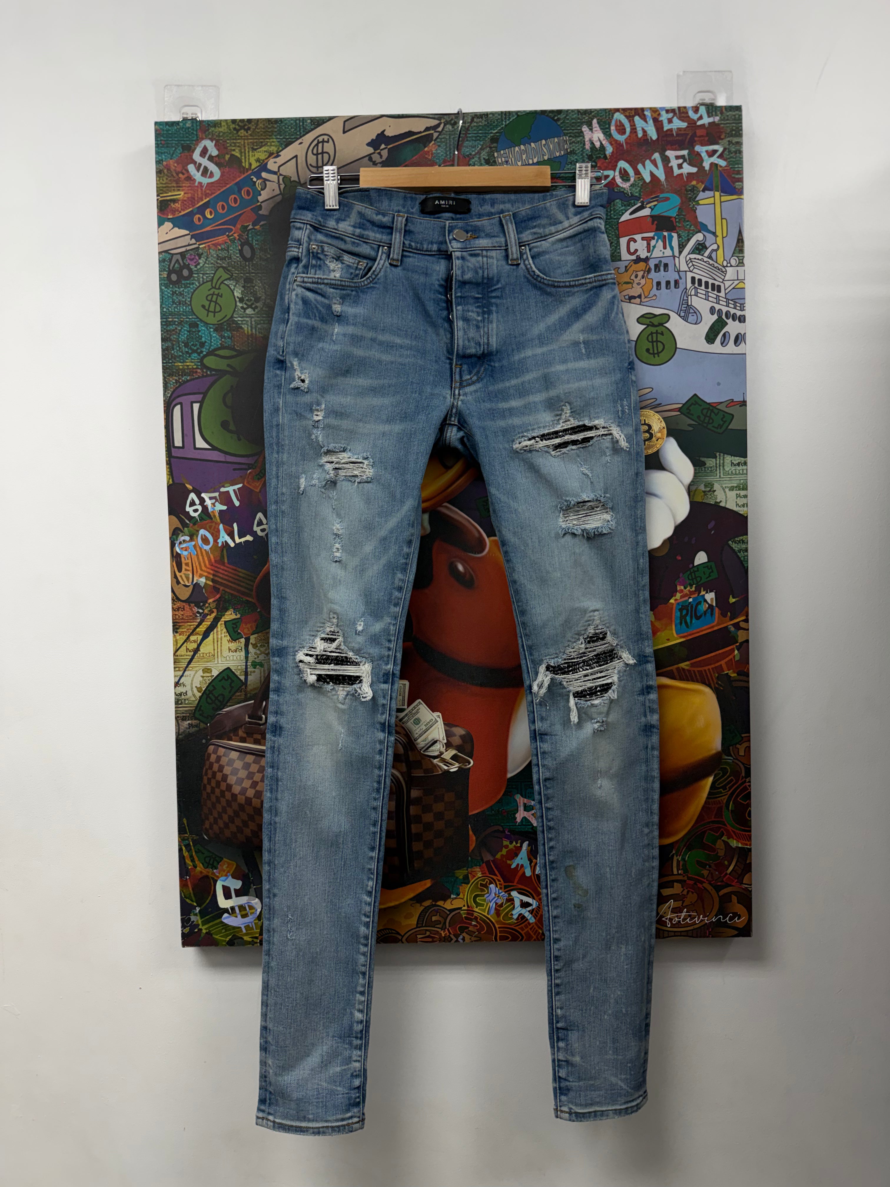 Amiri MX1 Light Wash Black Bandana Patch Jeans