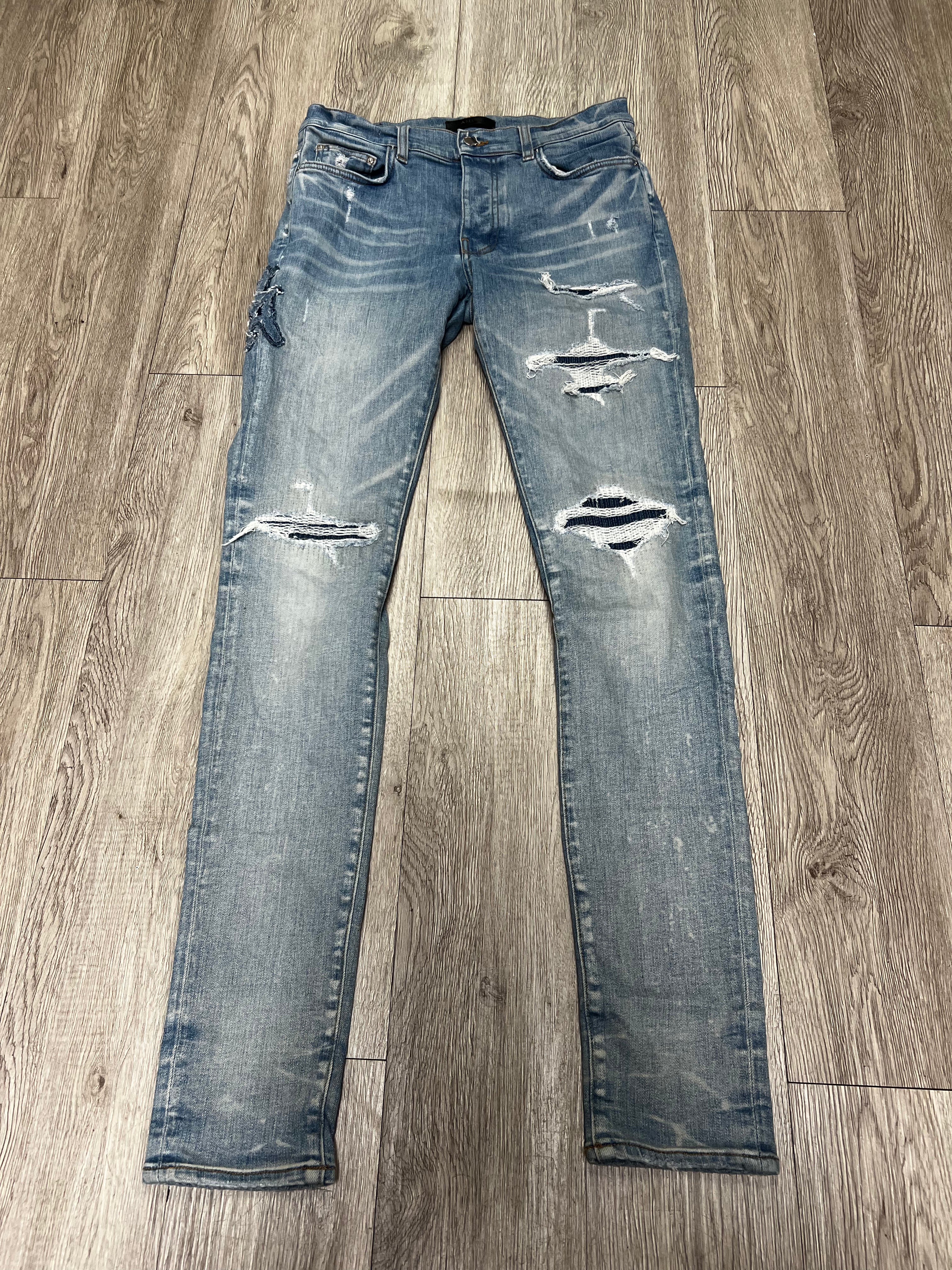 Amiri Light Wash Denim MA Logo Jeans