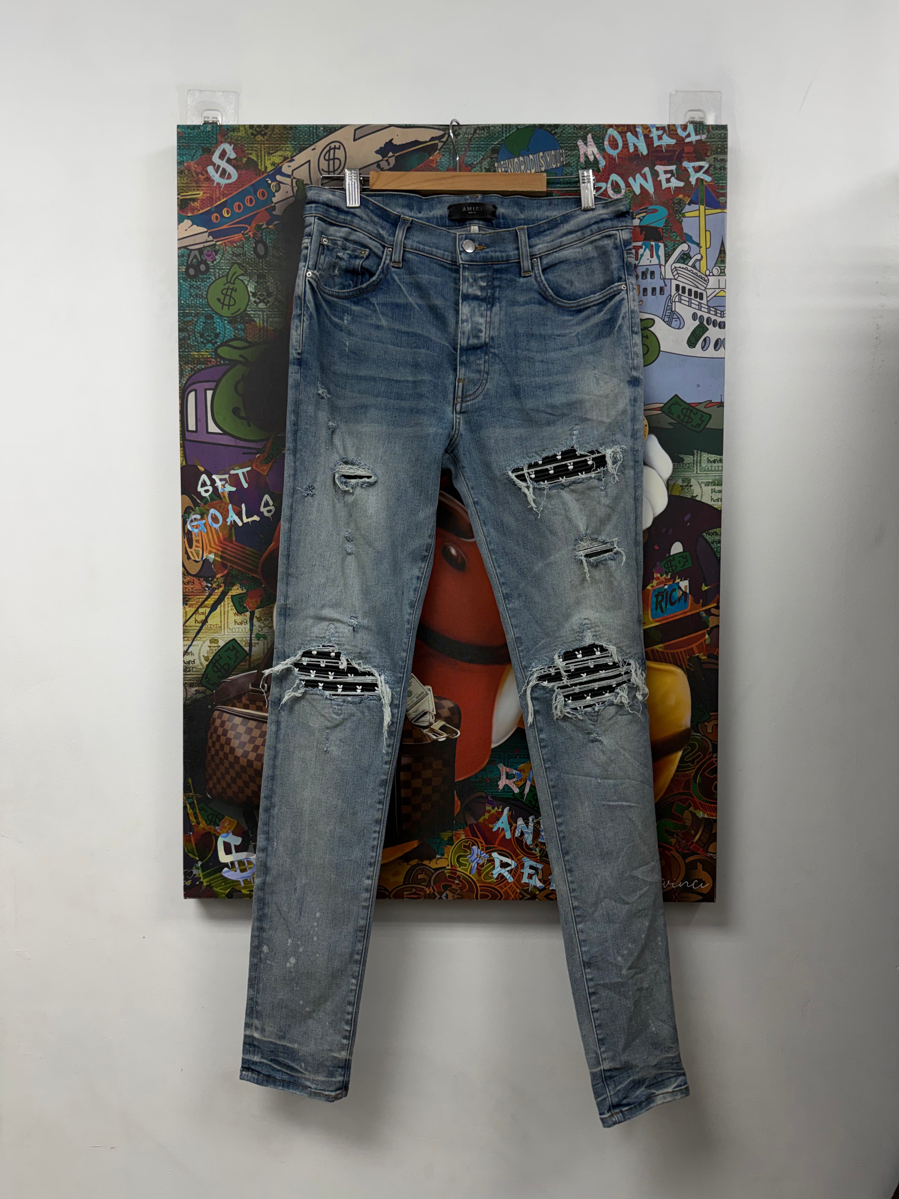 Amiri MX1 Light Wash Playboy Patch Jeans