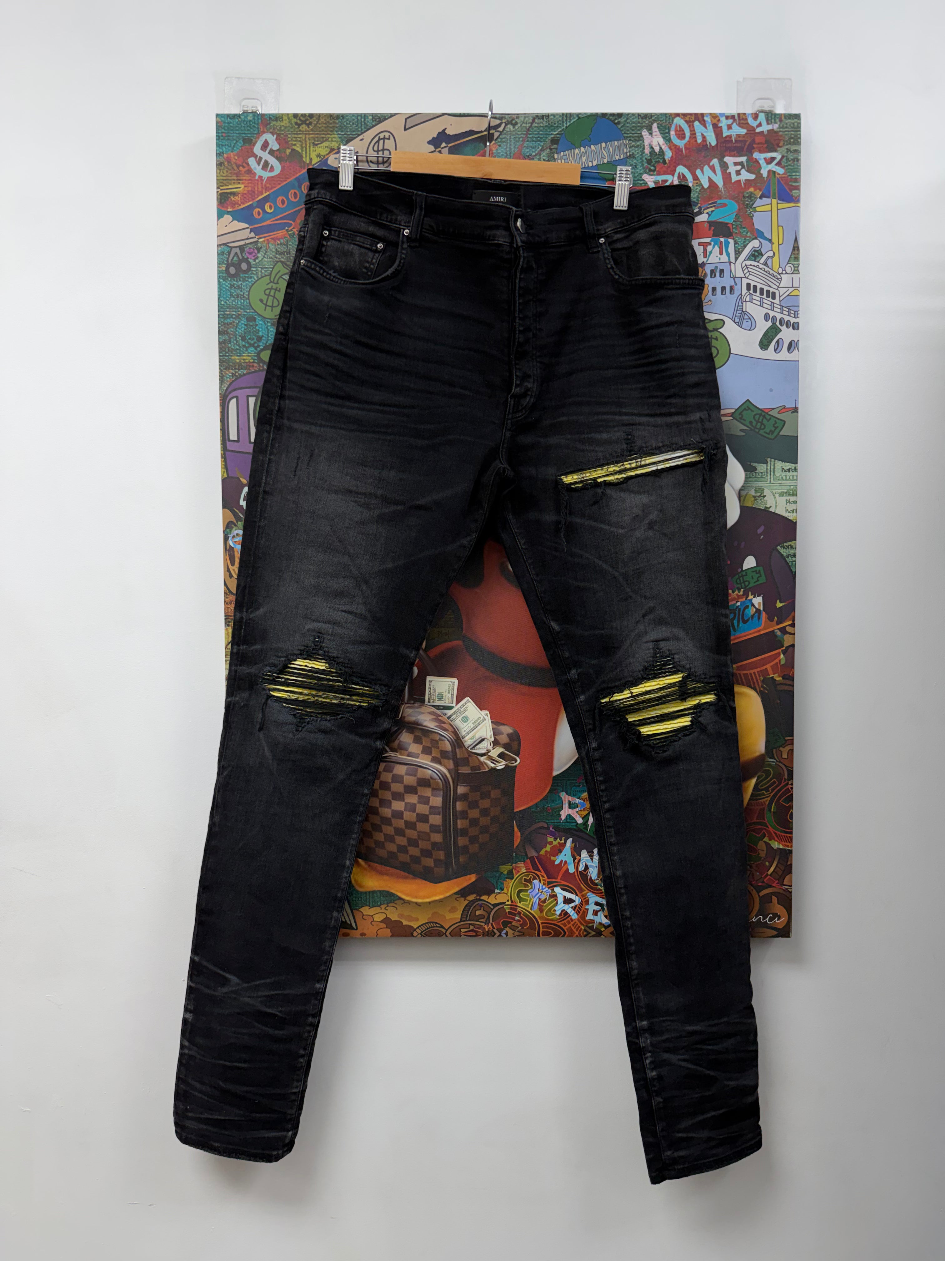 Amiri MX1 Faded Black International Yellow Patch Jeans
