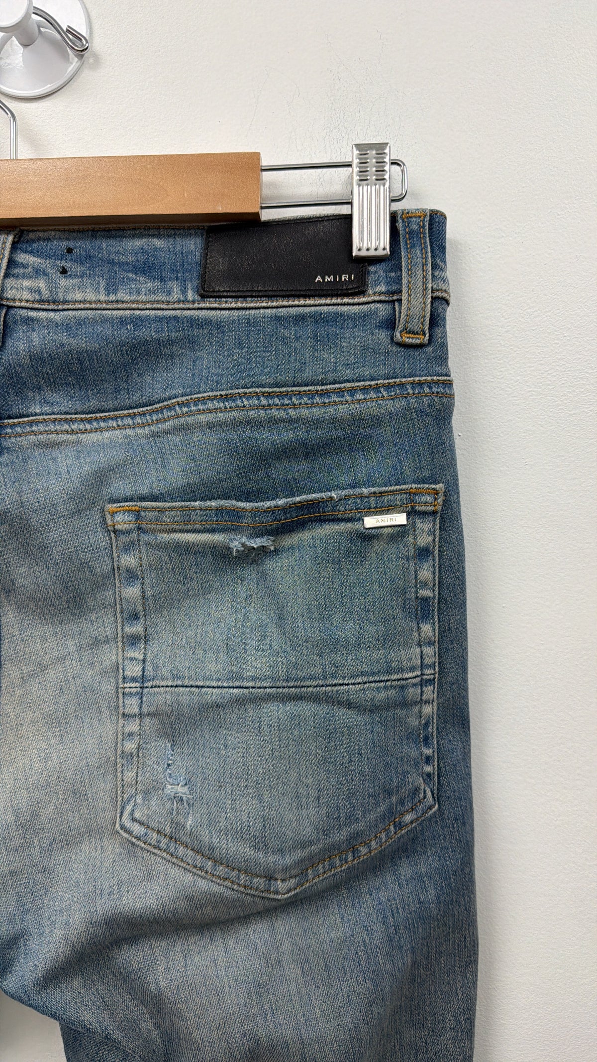 Amiri Light Wash Blue Tie Dye Thrasher Patch Jeans
