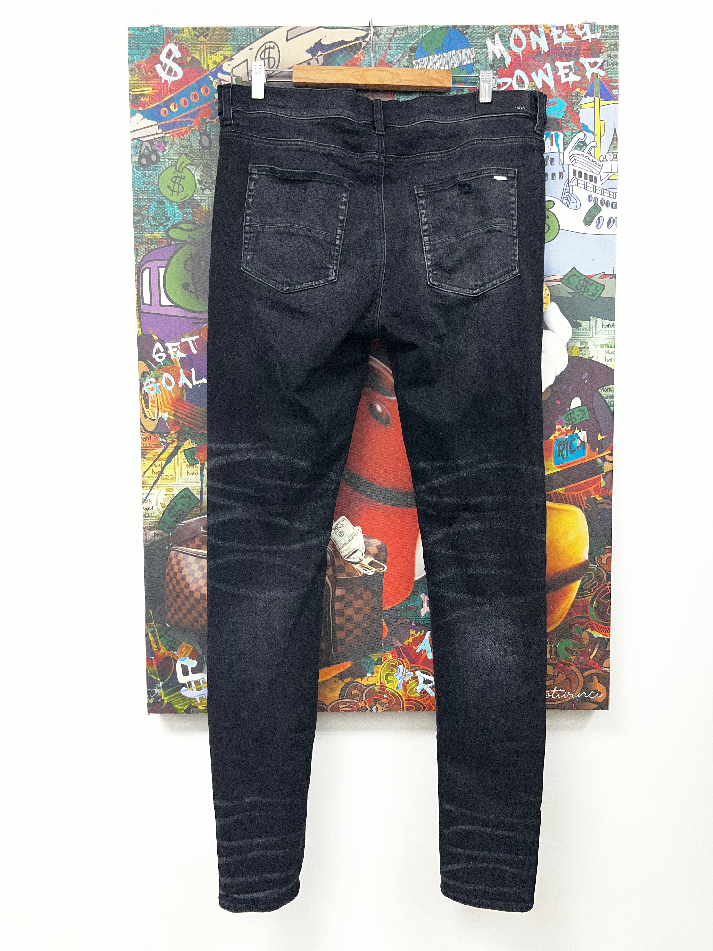 Amiri MX1 Black Wash Blue Crackle Patch Jeans