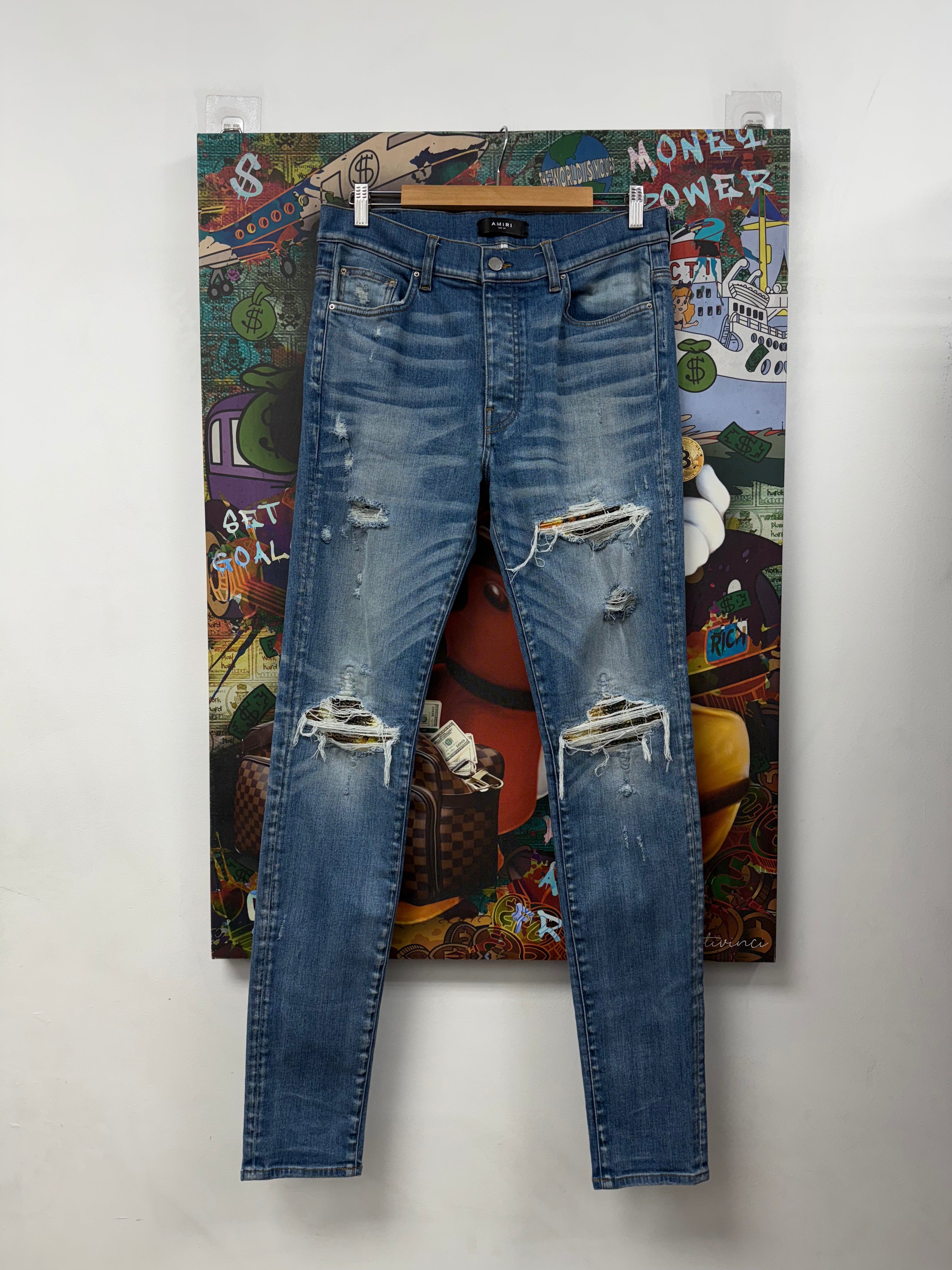 Amiri MX1 Light Wash Aloha Patch Jeans