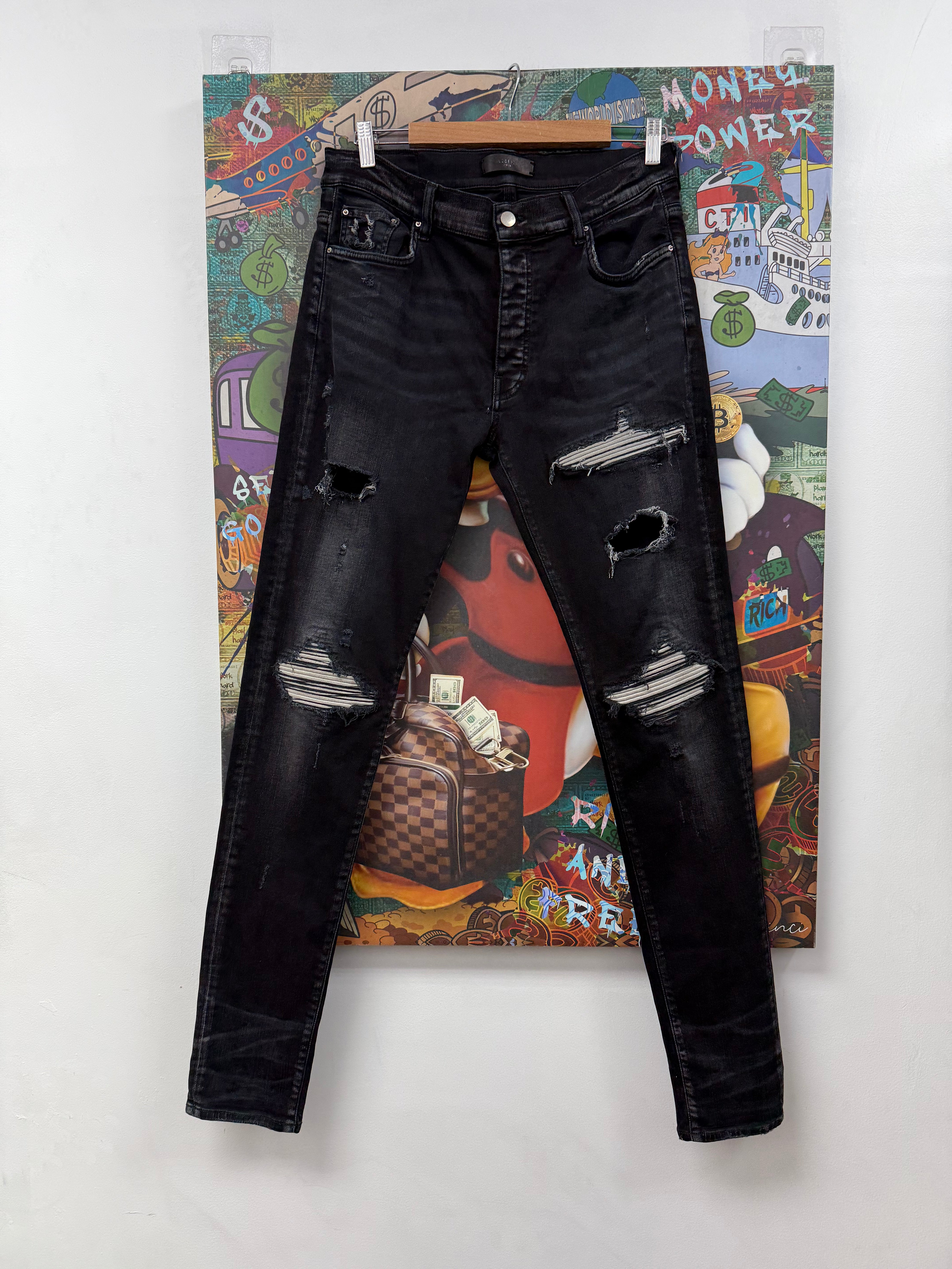 Amiri MX1 Black Wash White Patch Jeans