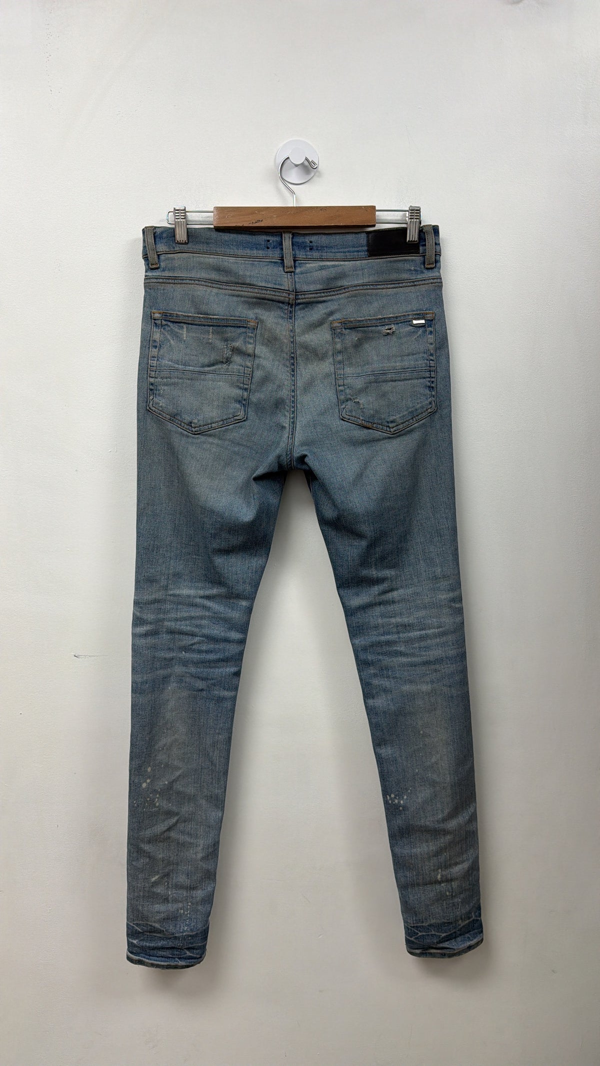 Amiri MX1 Light Wash Camo Patch Jeans