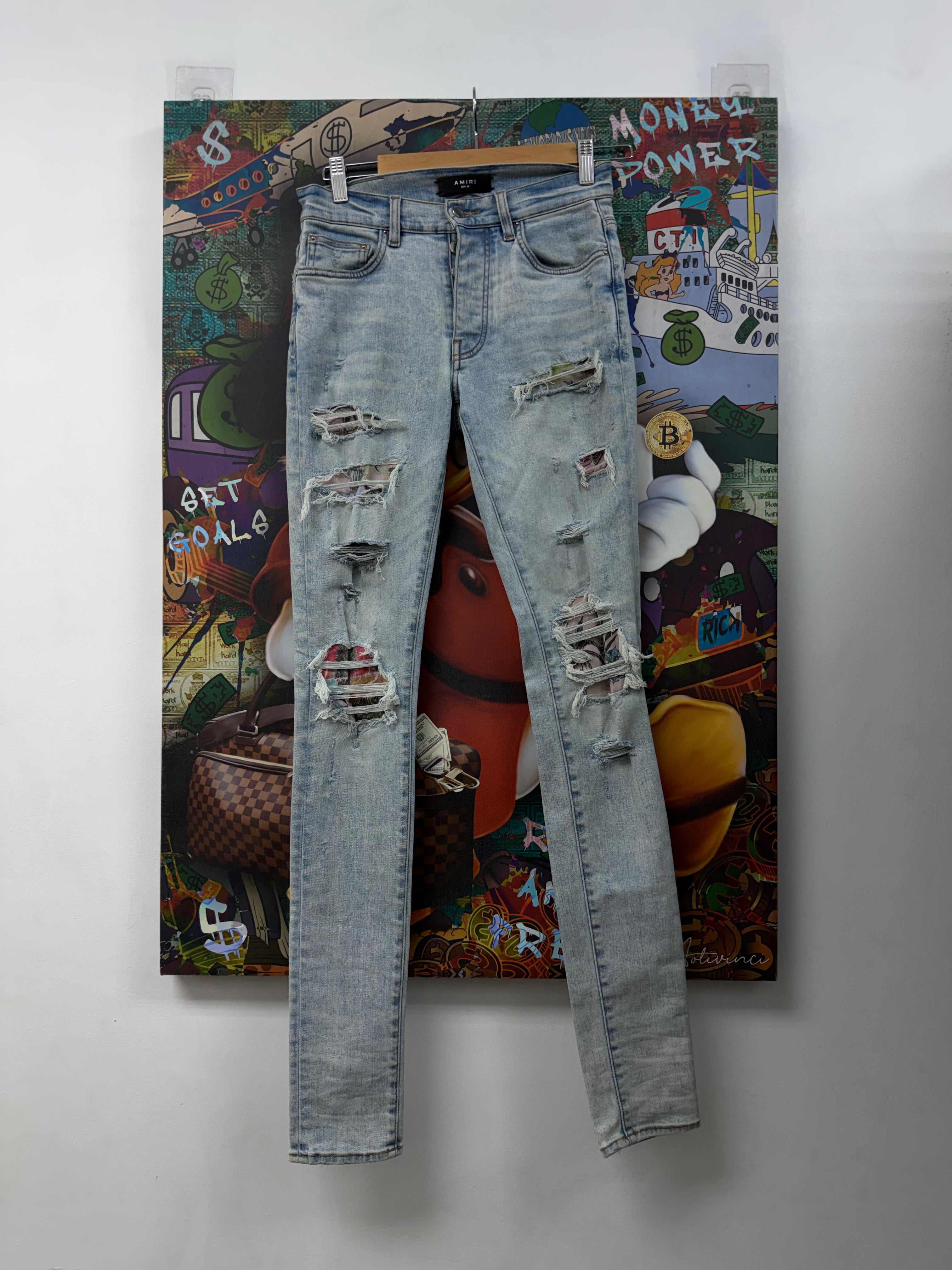 Amiri Light Wash Floral Patchwork Jeans