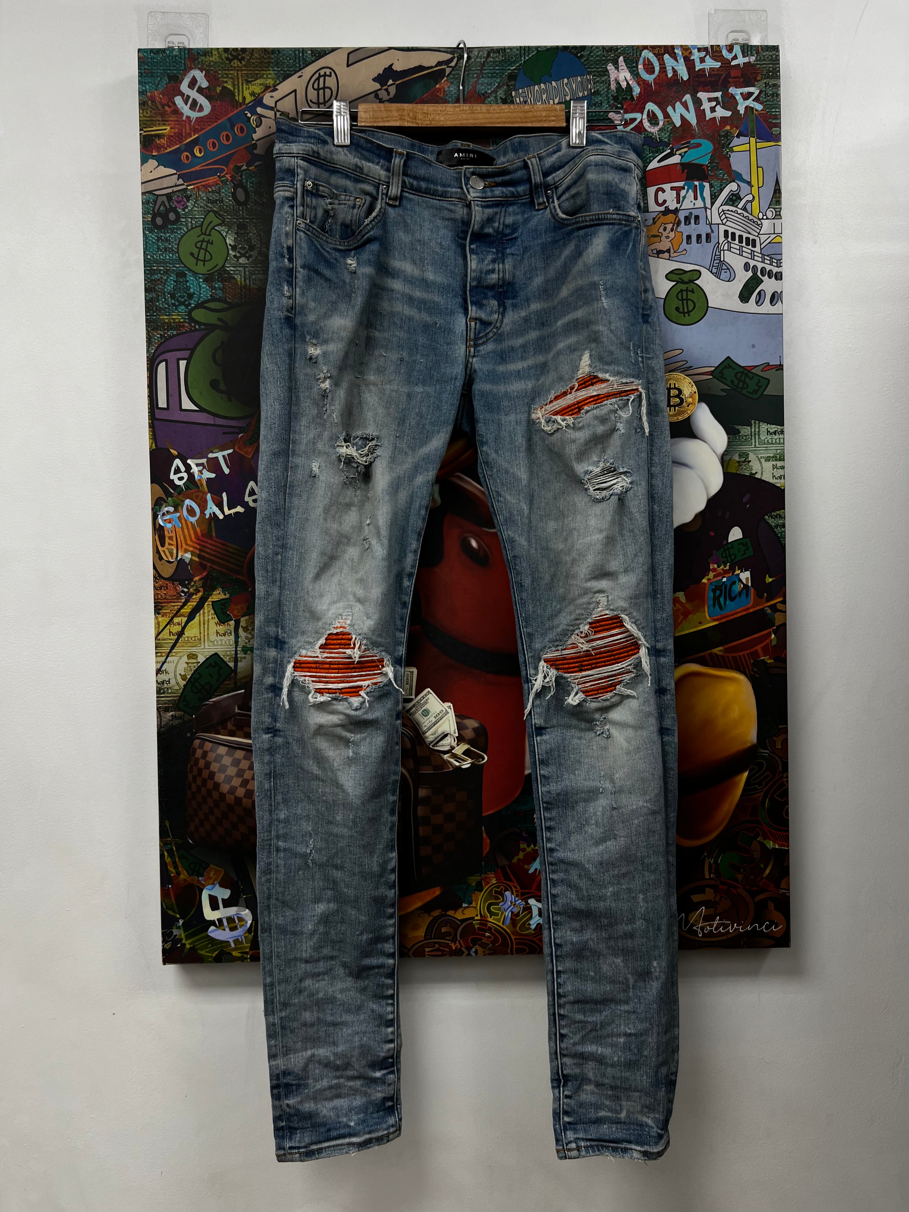 Amiri MX1 Light Wash Orange Crackle Patch Jeans