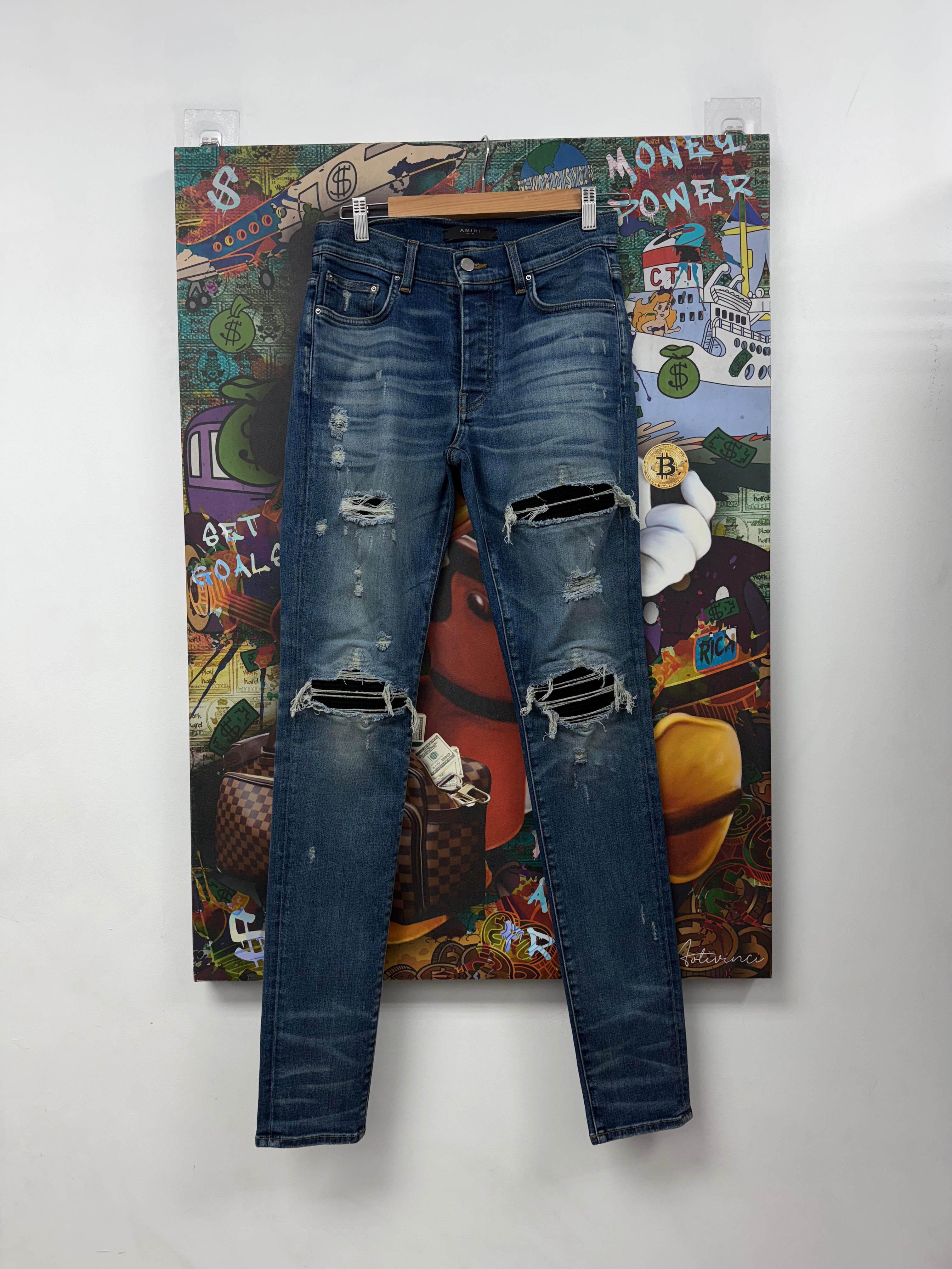 Amiri MX1 Light Wash Black Suede Patch Jeans