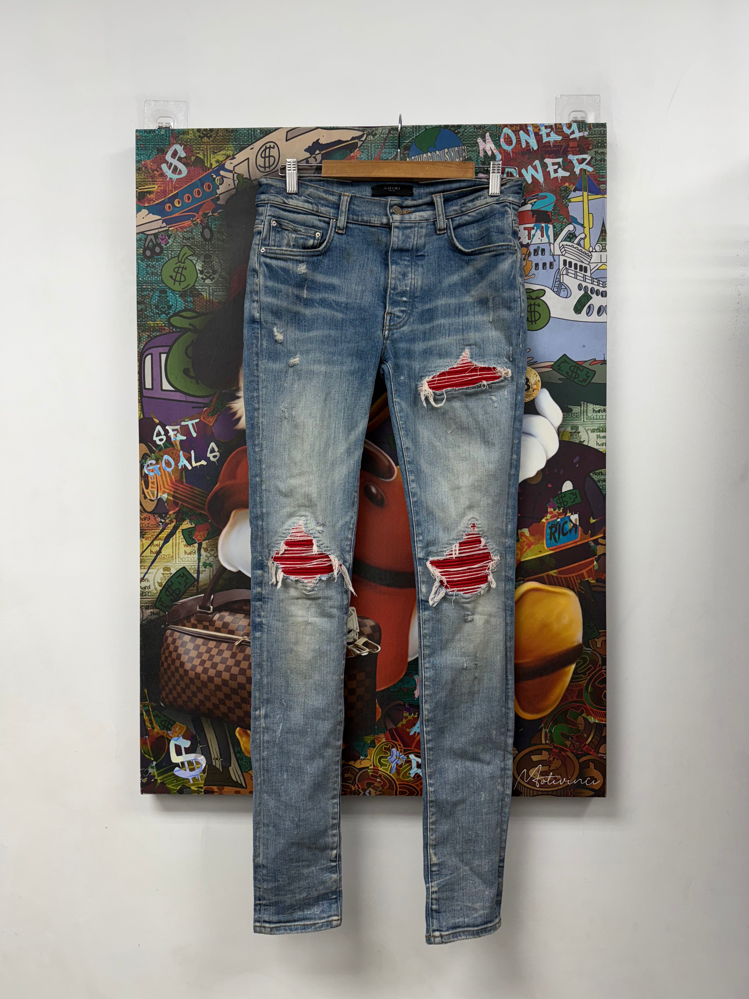 Amiri MX1 Light Wash Red Patch Jeans