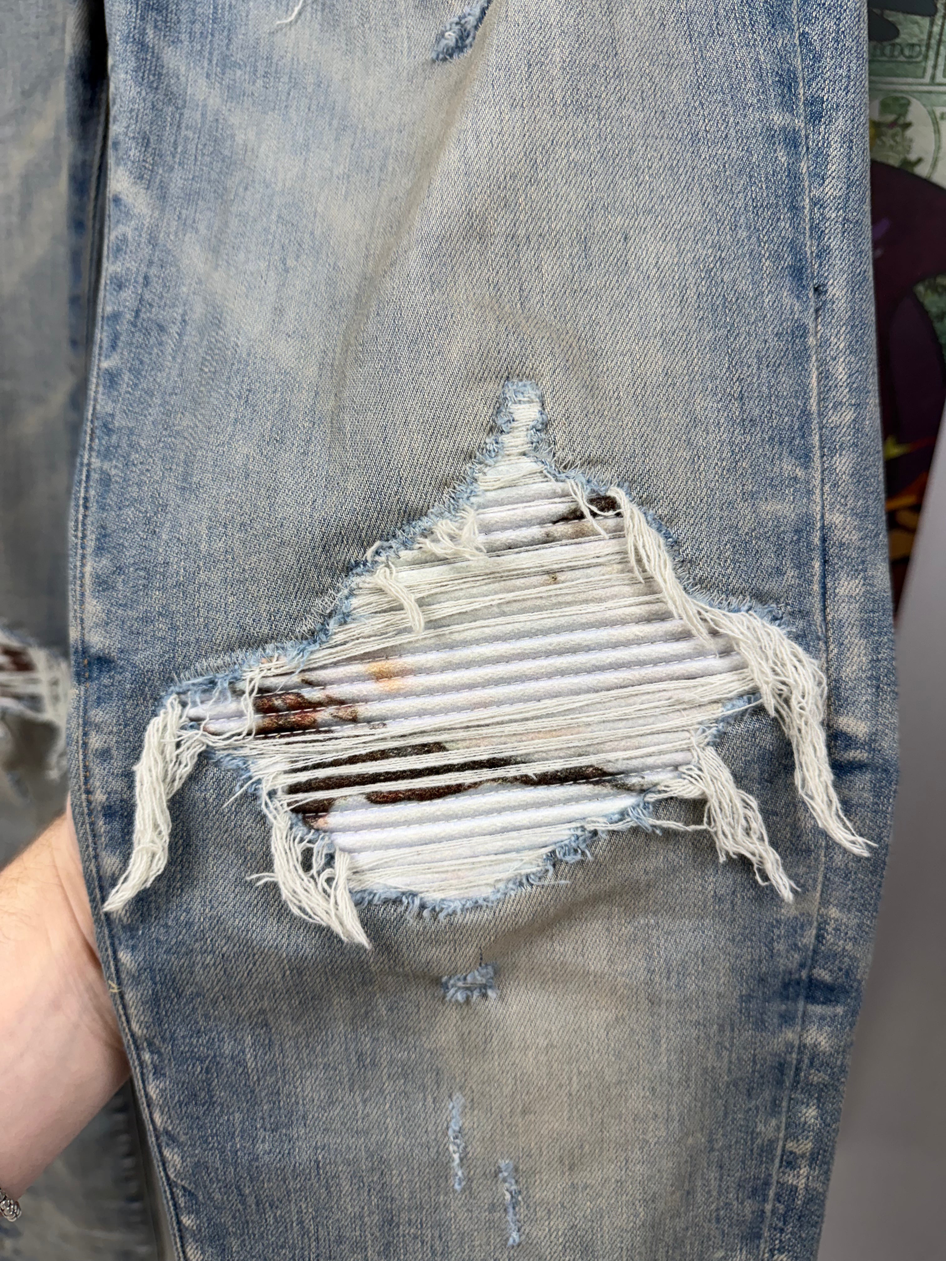 Amiri MX1 Light Wash Marble Patch Jeans