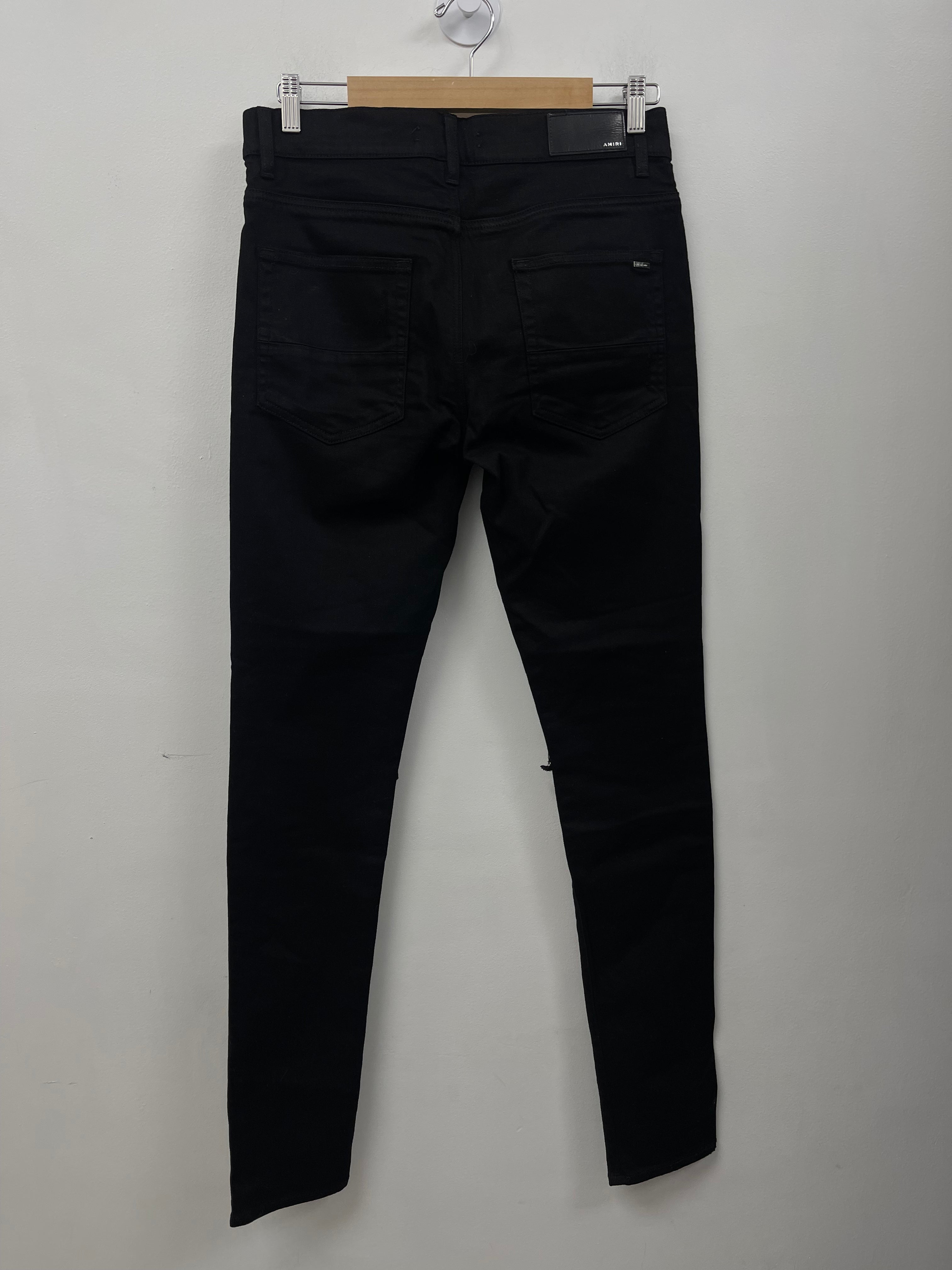 Amiri MX1 Black Leather Patch Jeans