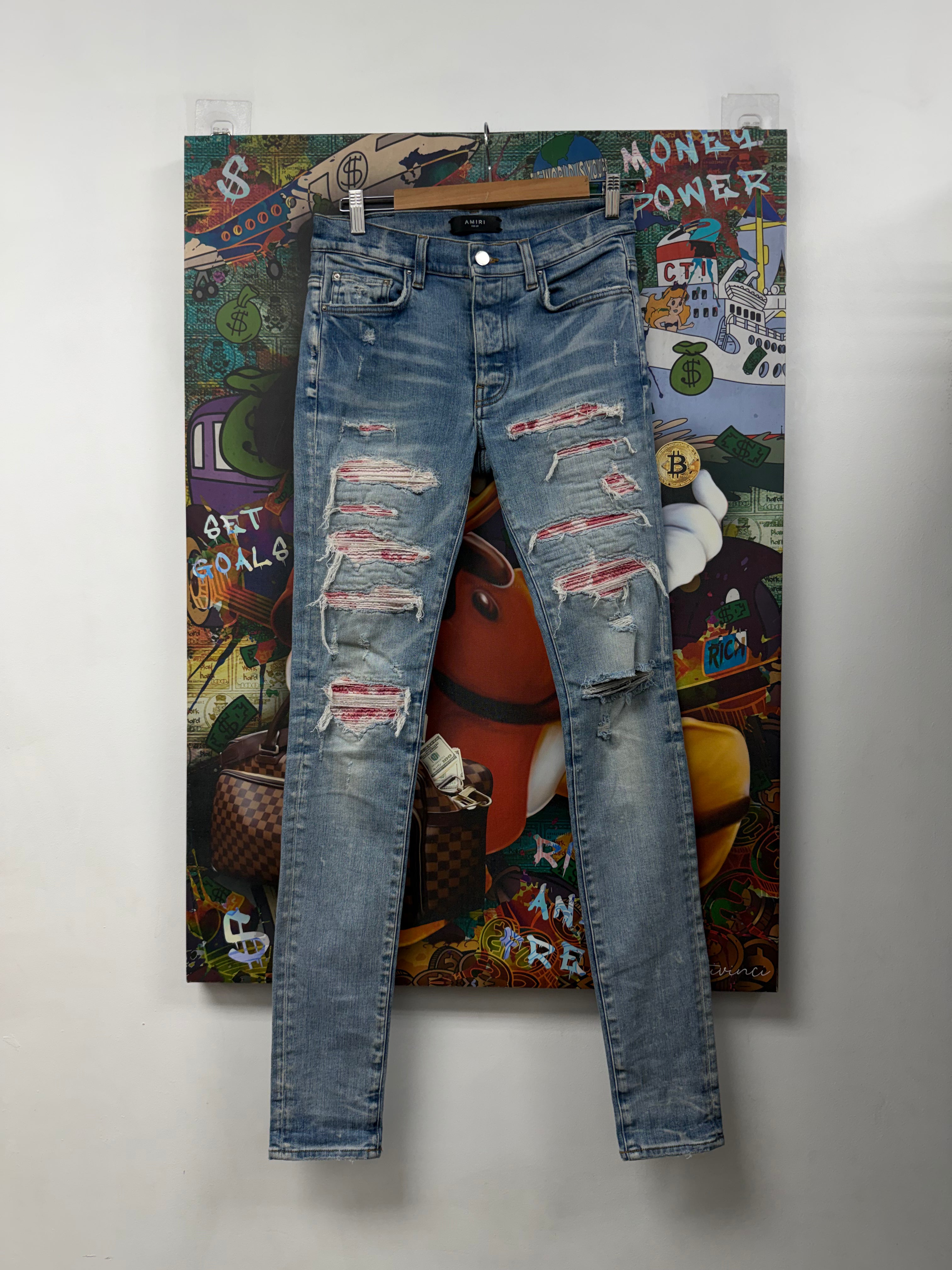 Amiri Light Wash Pink Tie Dye Thrasher Patch Jeans
