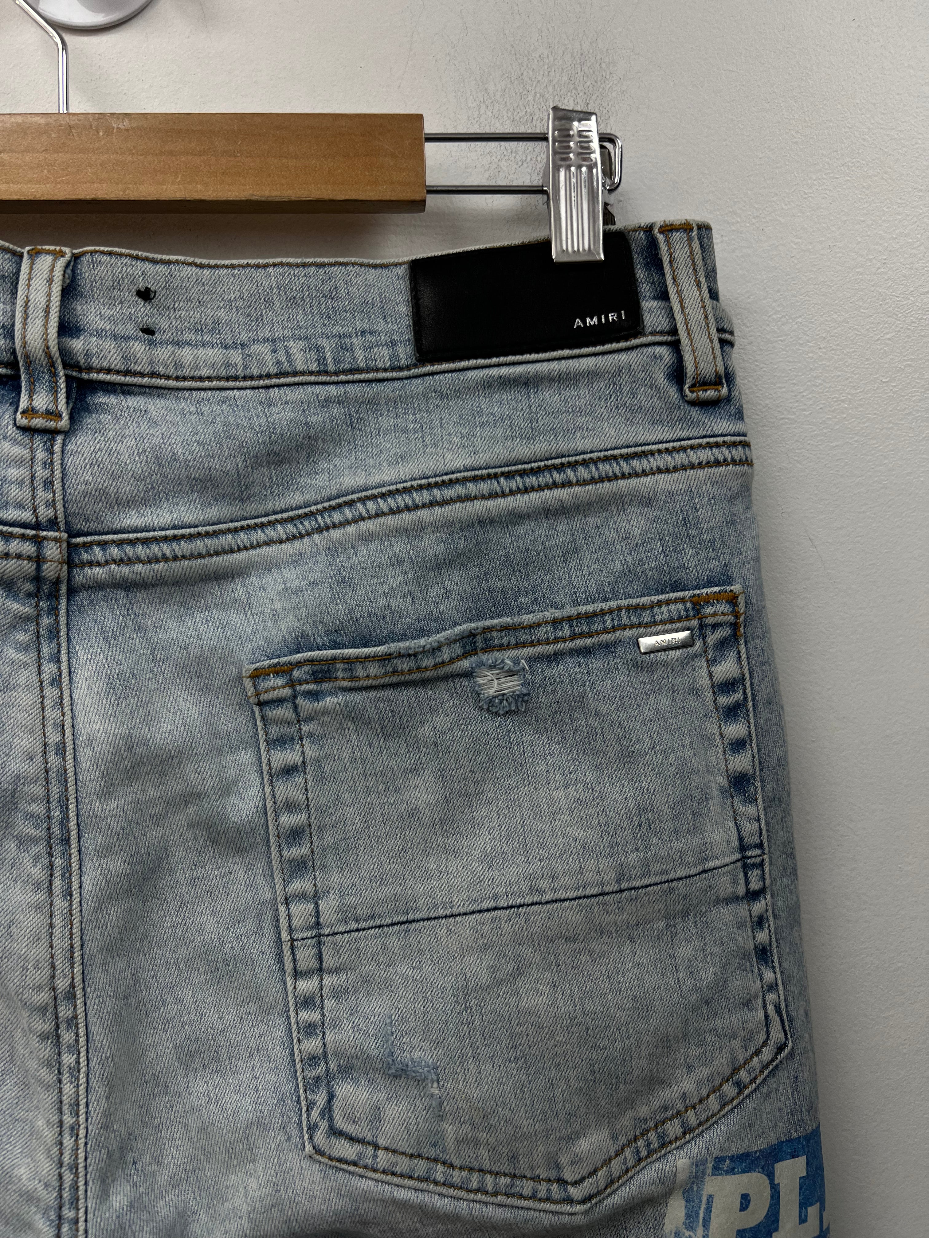 Amiri Light Wash Playboy Magazine Jeans
