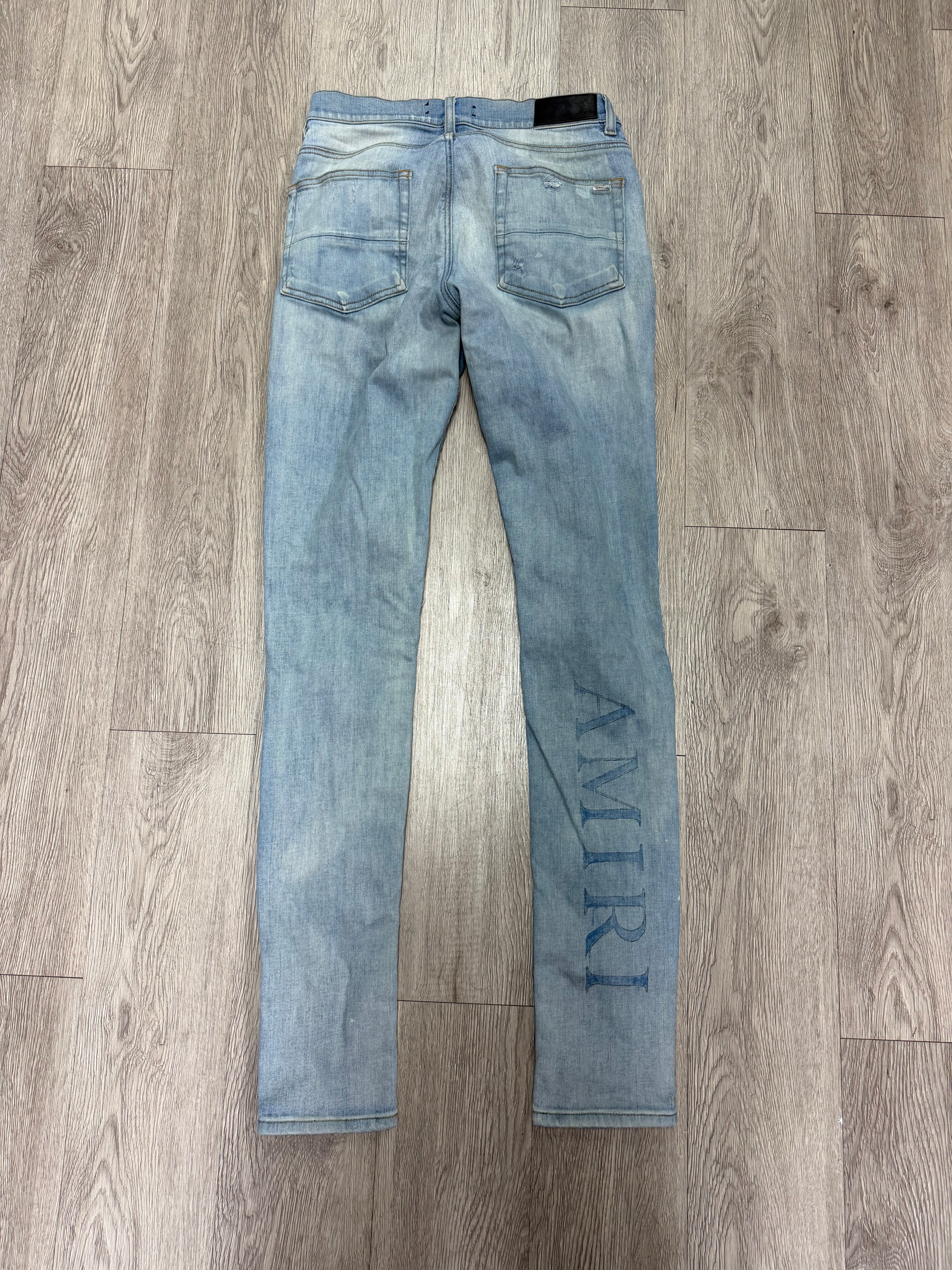 Amiri Light Wash MA Baby Blue Drip Jeans