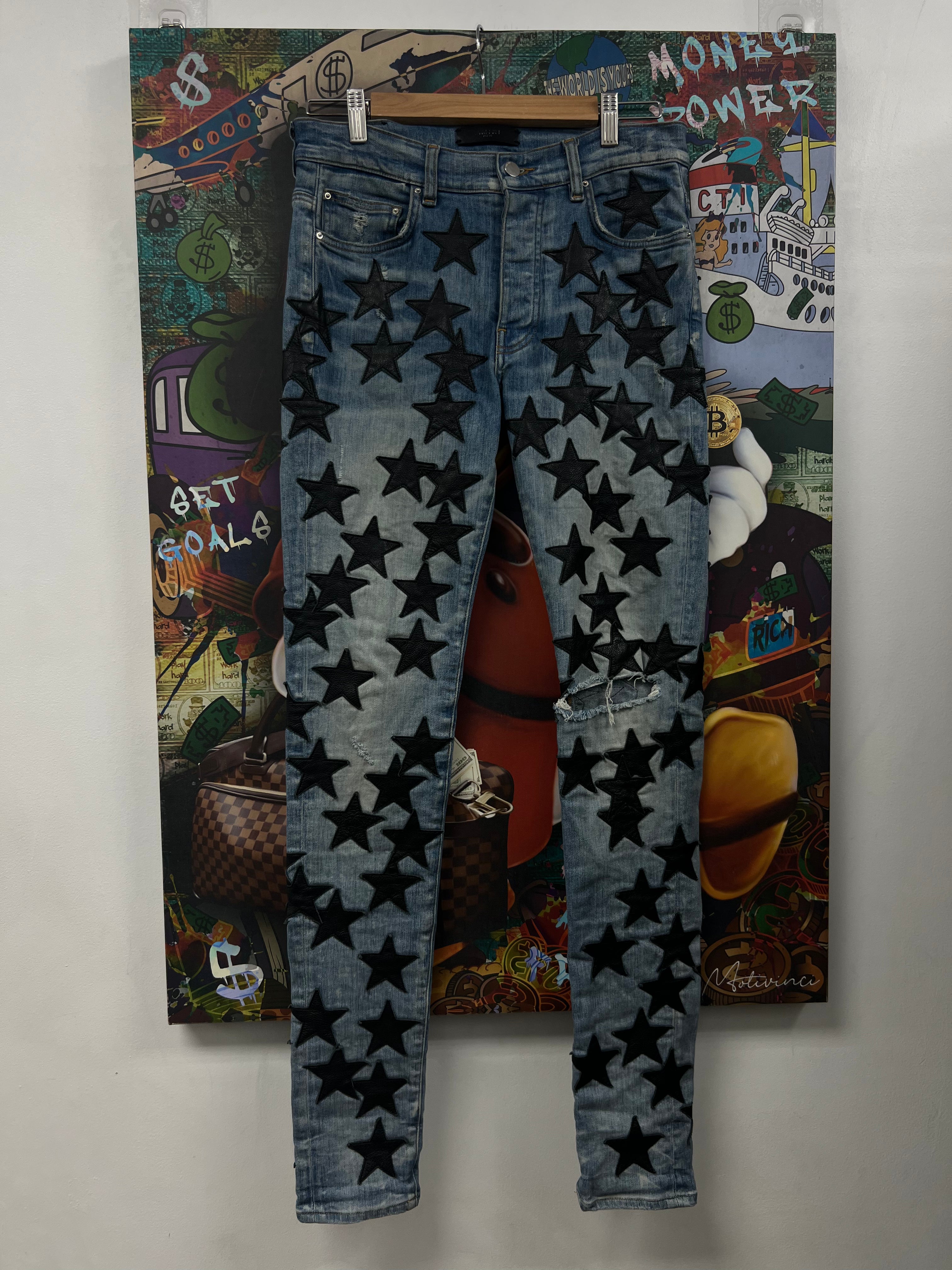 Amiri Light Wash Black Leather Chemist Stars Jeans