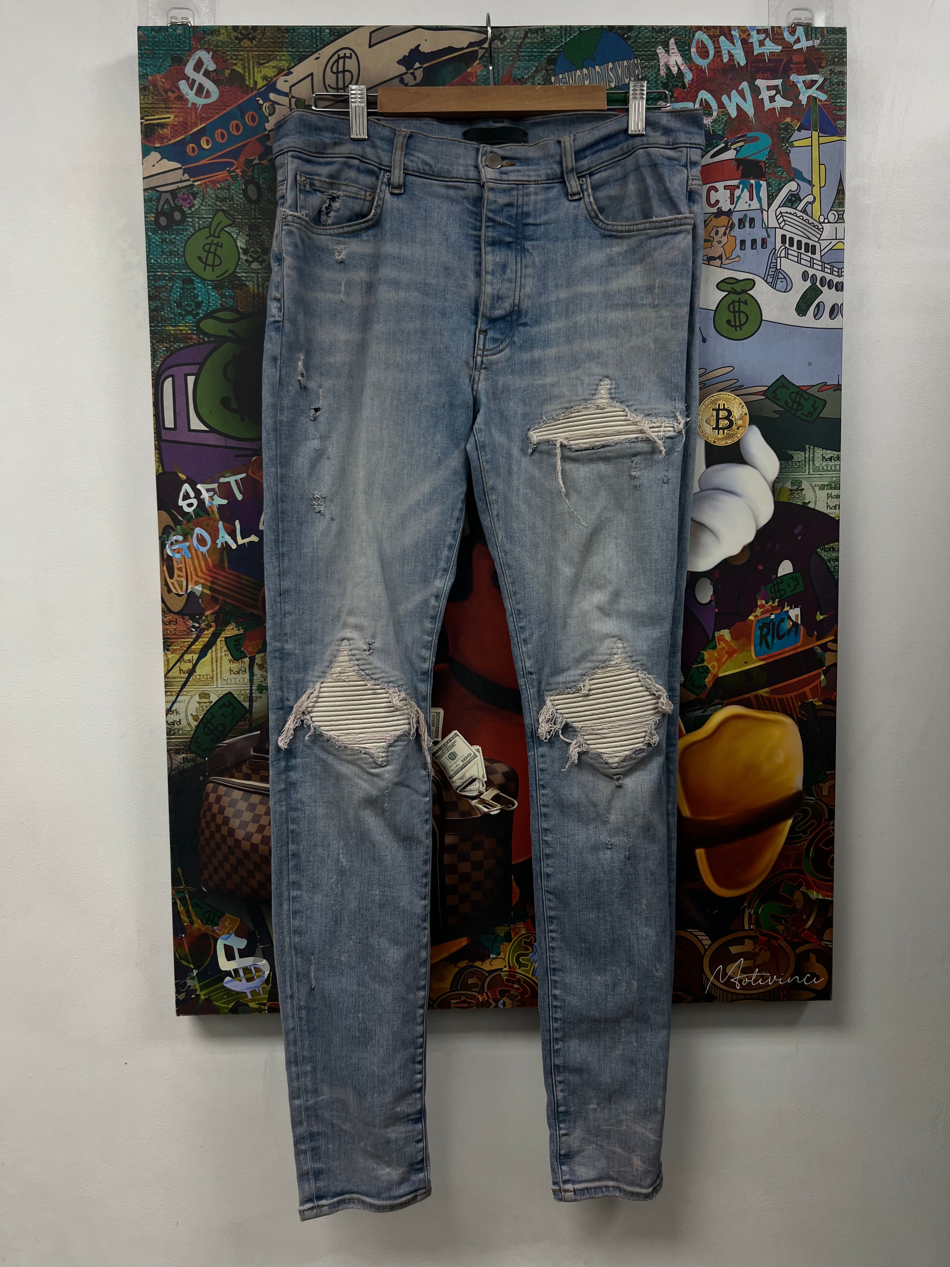 Amiri MX1 Light Wash White Ultra Suede Patch Jeans