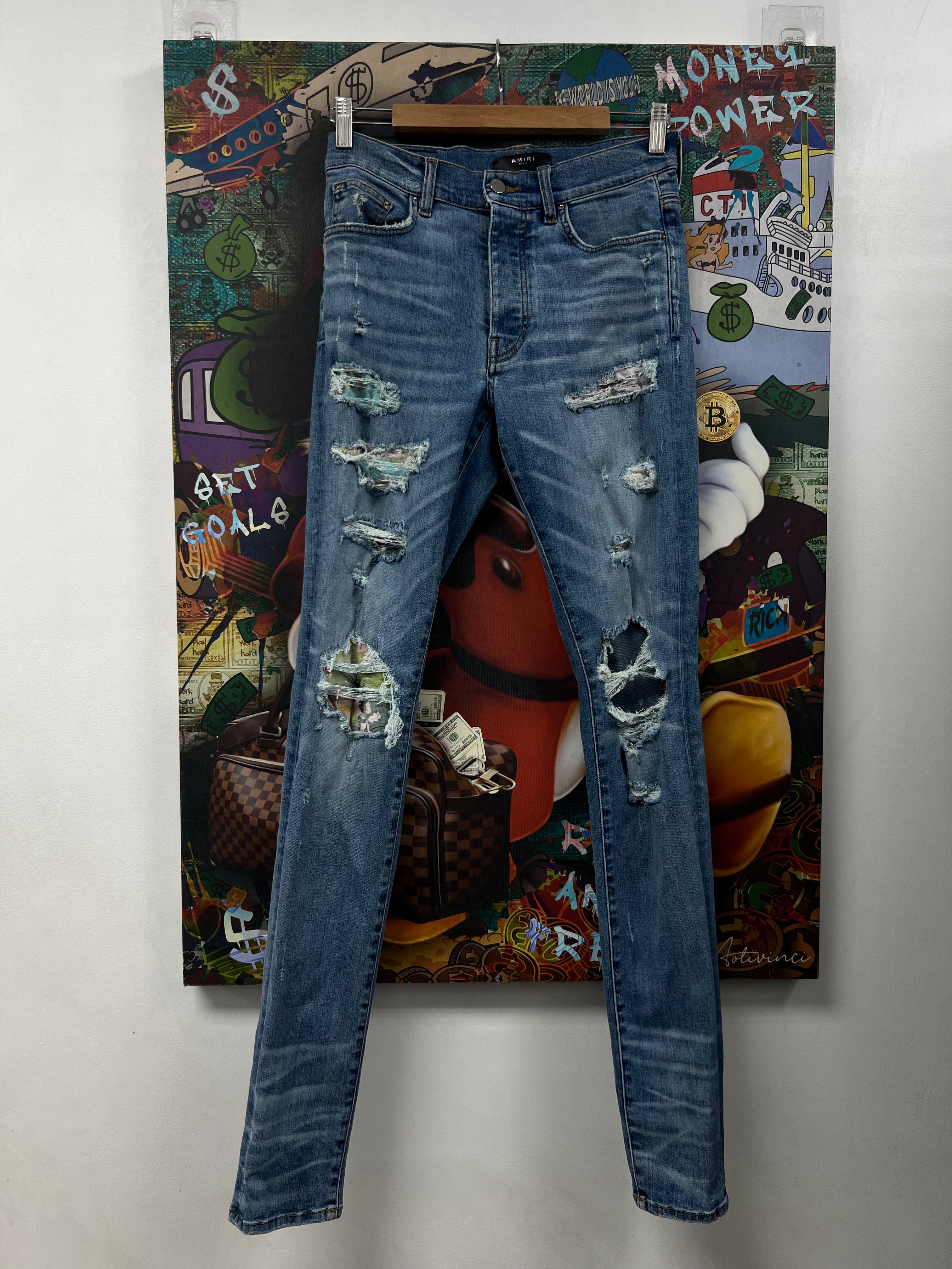 Amiri Light Wash Floral Thrasher Jeans