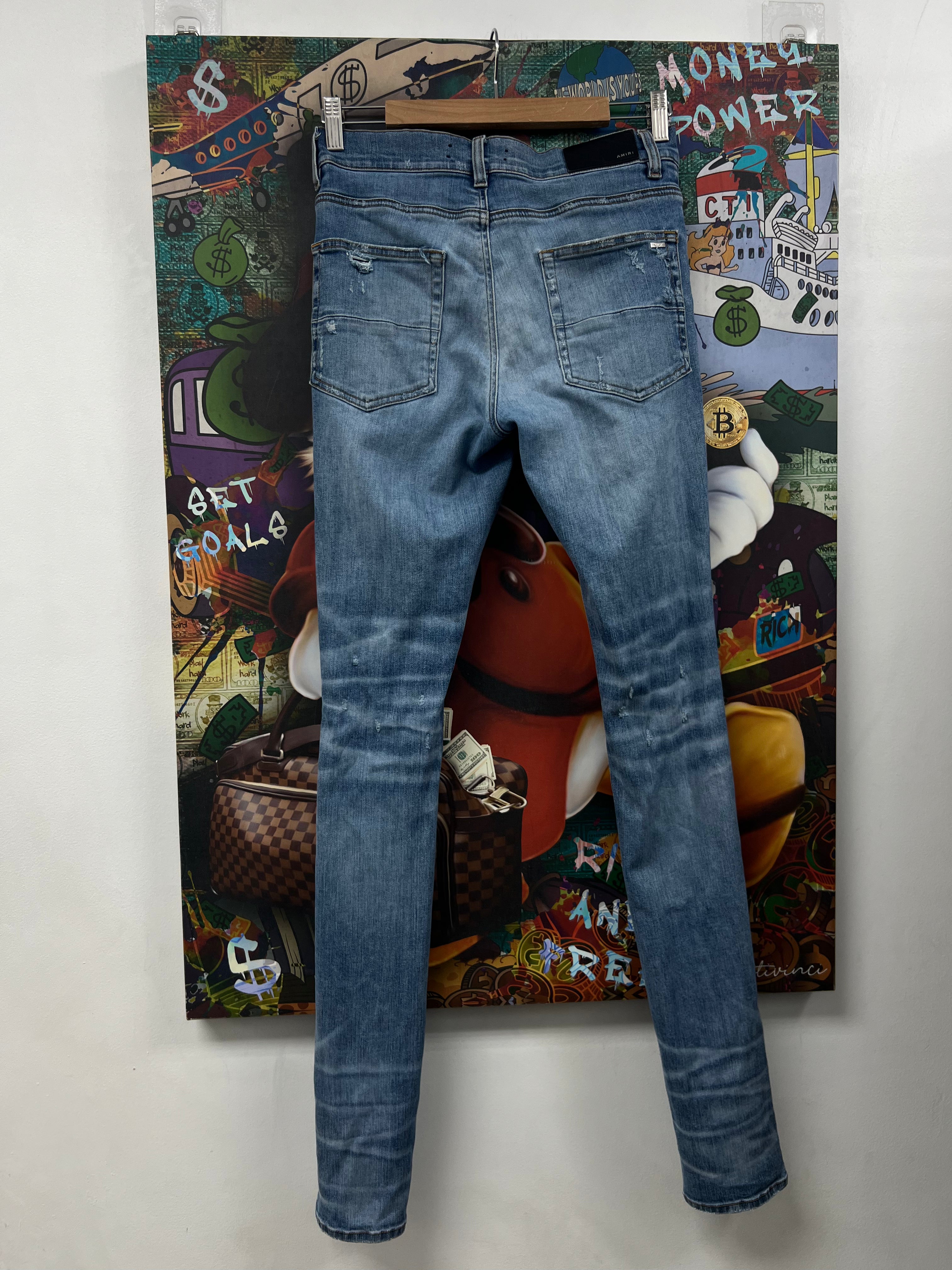 Amiri Light Wash Floral Thrasher Jeans