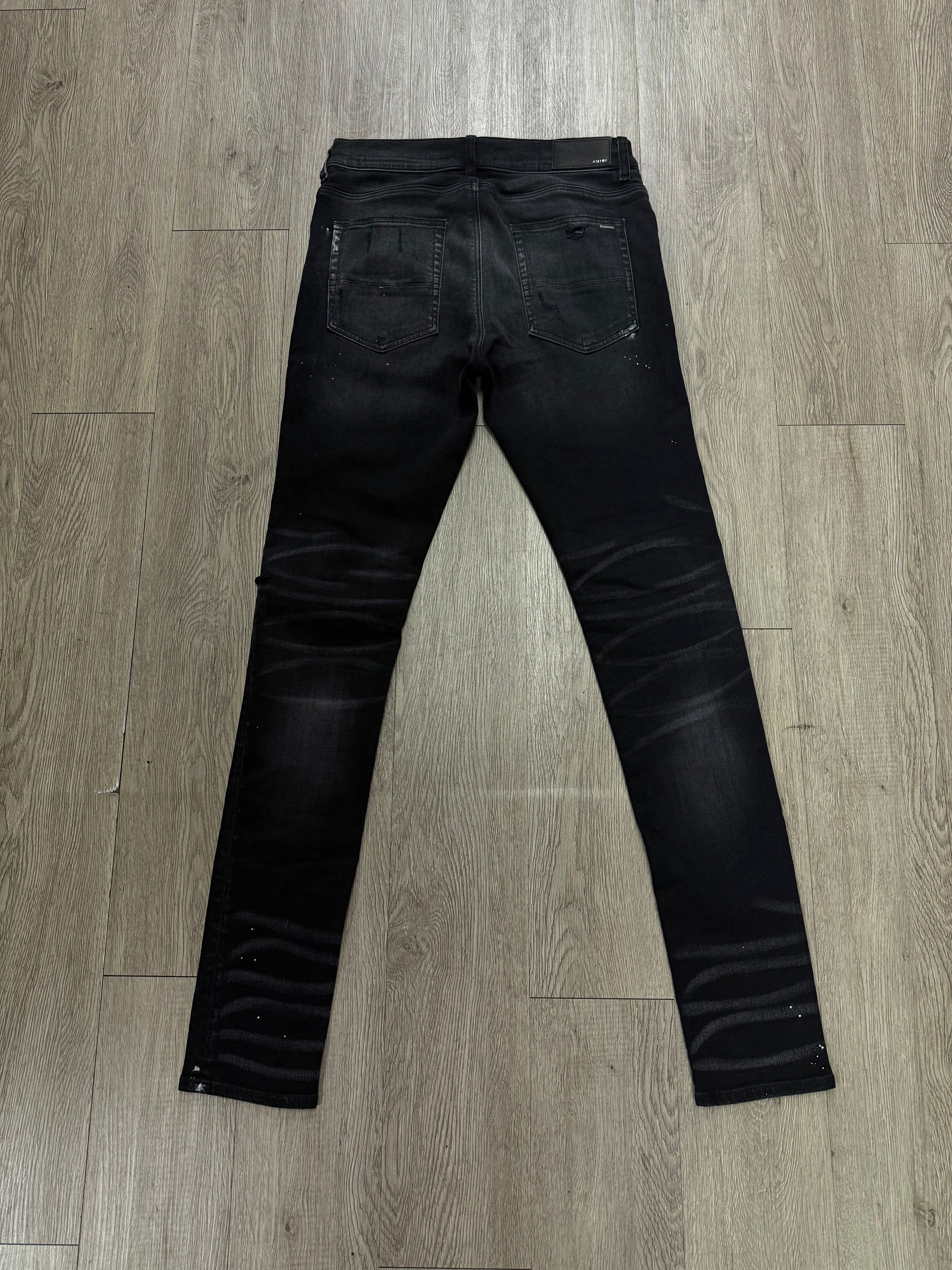 Amiri MX1 Black Wash Brown Plaid Patch Jeans