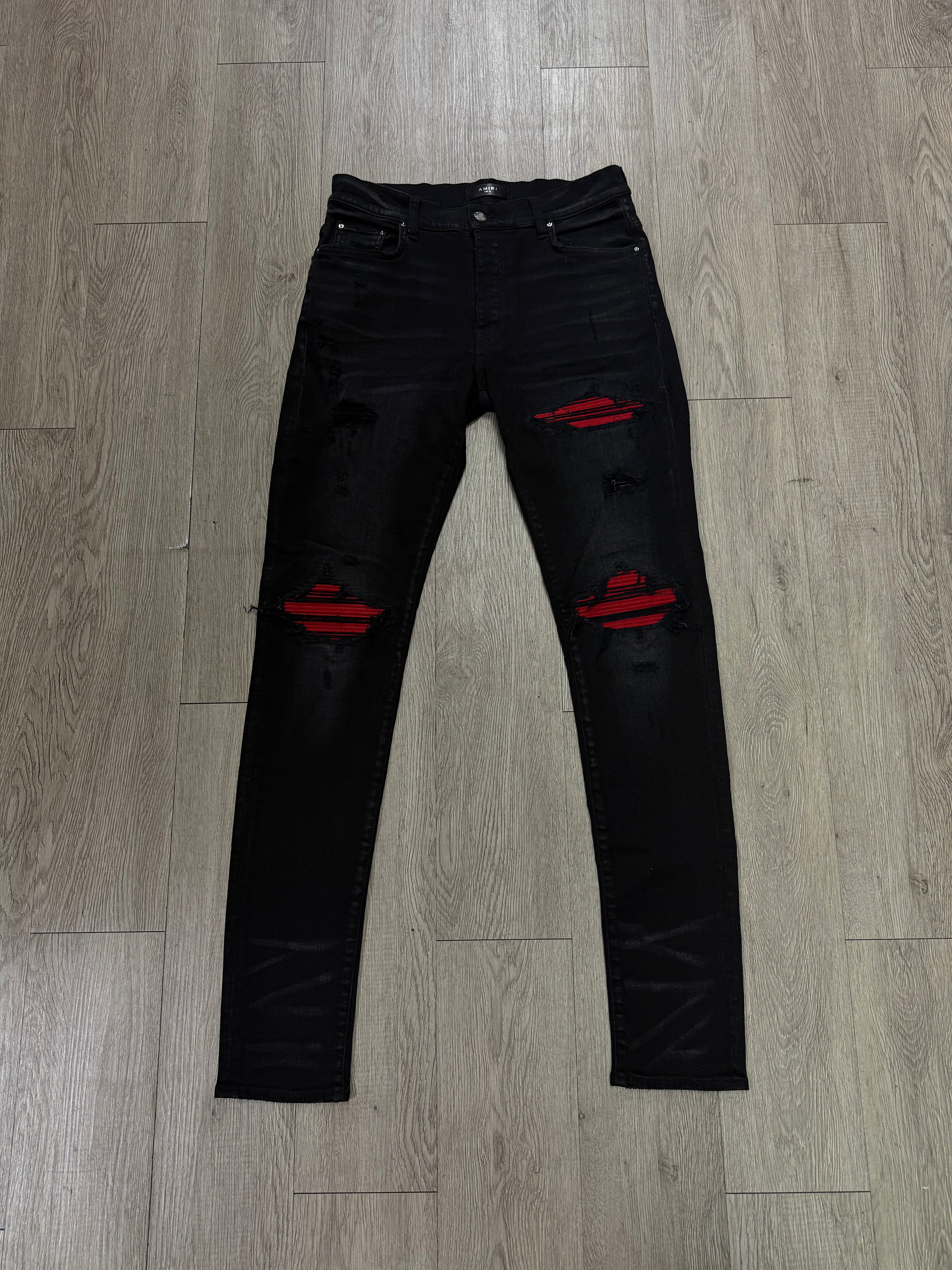 Amiri MX1 Black Wash Red Patch Jeans