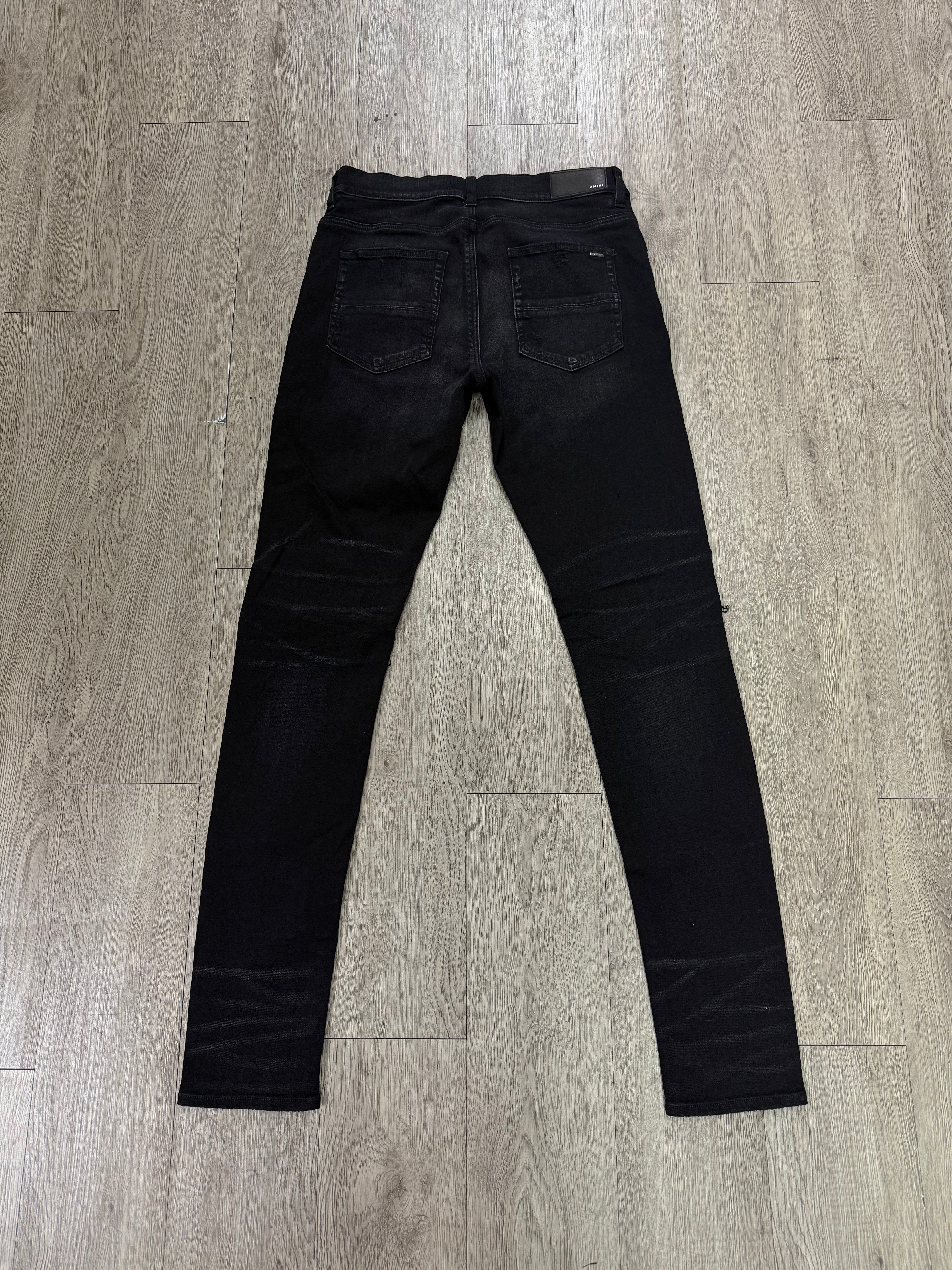Amiri MX1 Black Wash Red Patch Jeans