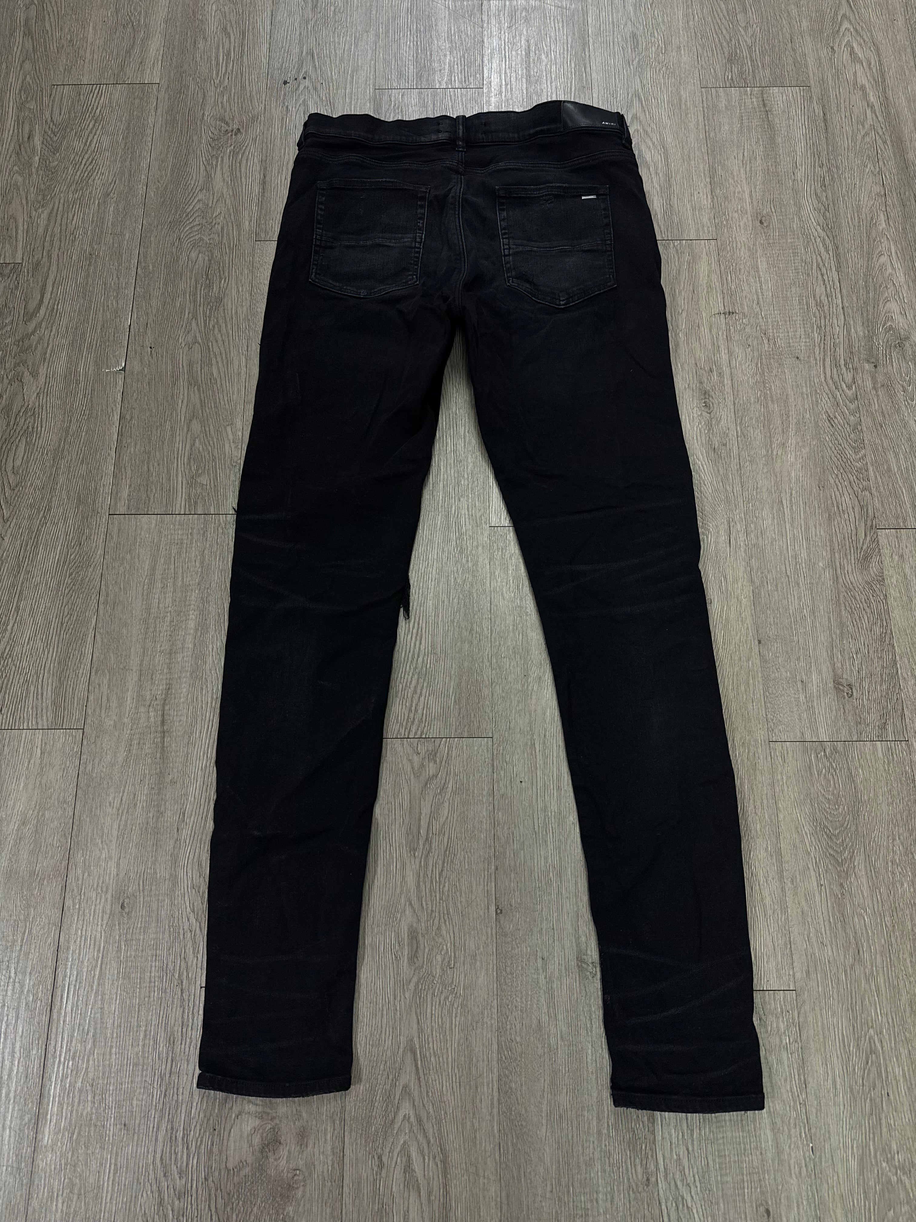 Amiri MX1 Black Wash Purple Suede Patch Jeans